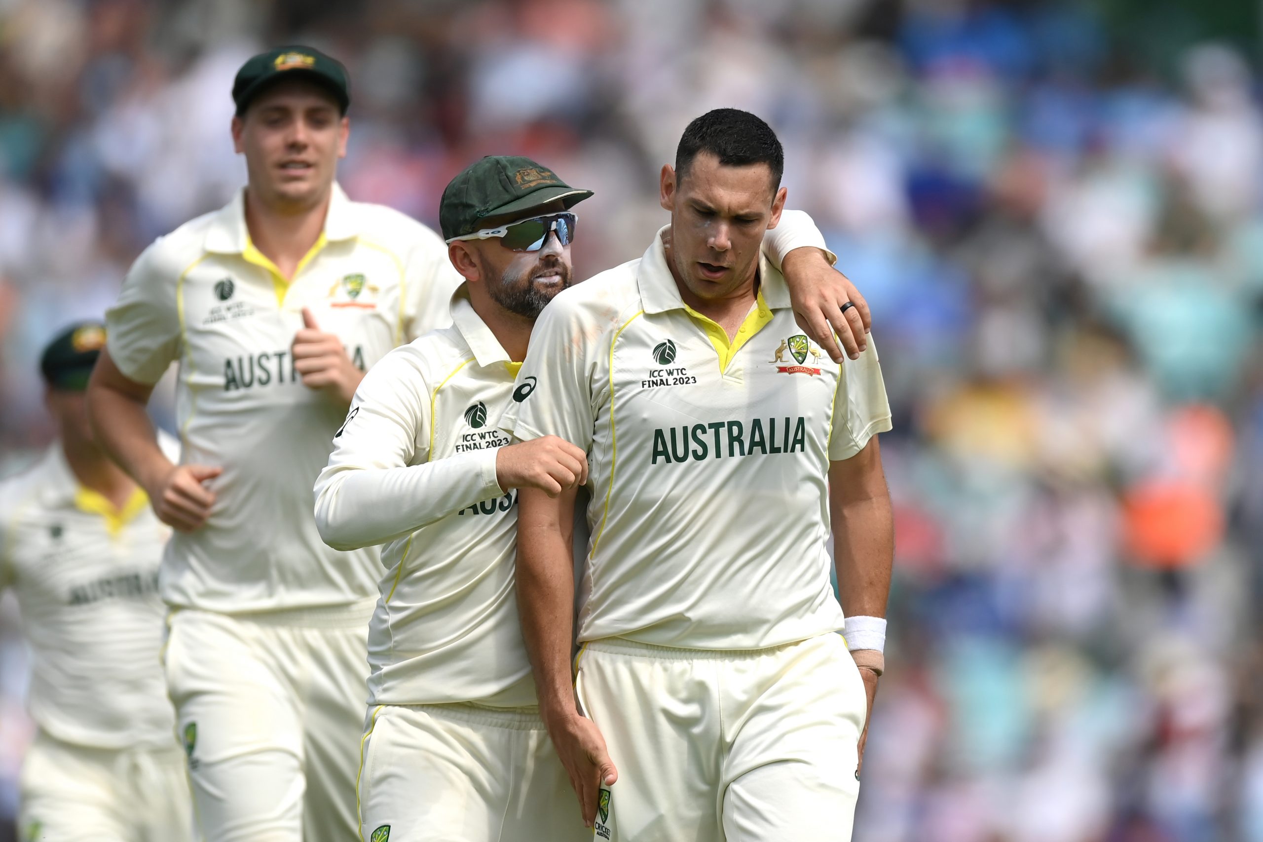 Nathan Lyon of Australia congratulates teammate Scott Boland during the WTC final.