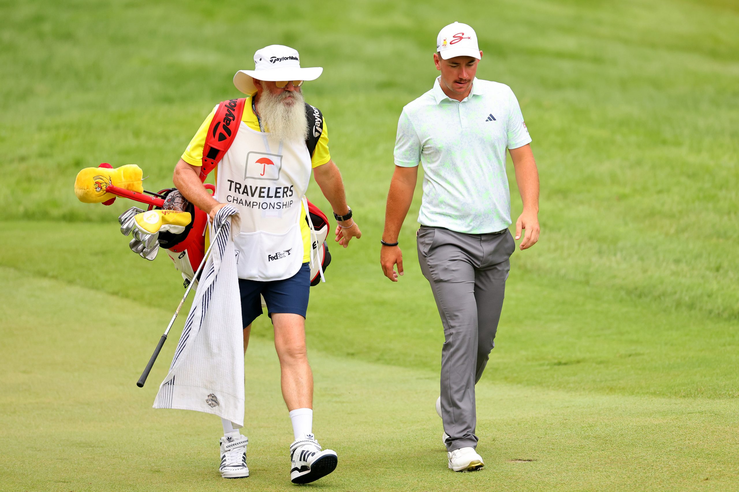 Lucas Herbert of Australia walks with his caddie up the tenth hole during the second round of the Travelers Championship at TPC River Highlands on June 23, 2023 in Cromwell, Connecticut. (Photo by Stacy Revere/Getty Images)