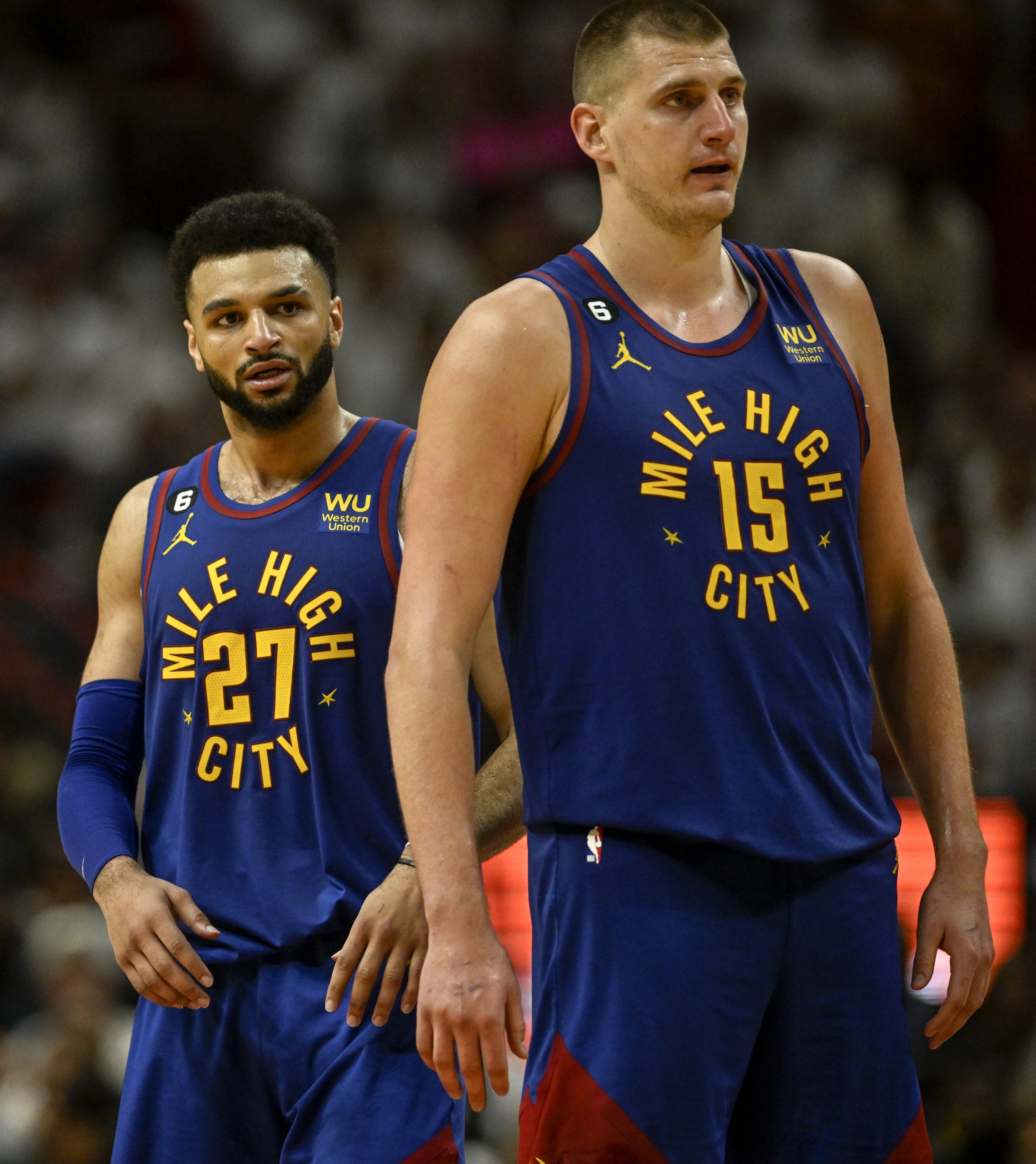 MIAMI, FL - JUNE 7: Jamal Murray (27) and Nikola Jokic (15) of the Denver Nuggets lead in the fourth quarter of the Nuggets' 104-94 win over the Miami Heat during Game 3 of the NBA Finals at the Kaseya Center in Miami on Wednesday, June 7, 2023. (Photo by AAron Ontiveroz/The Denver Post)