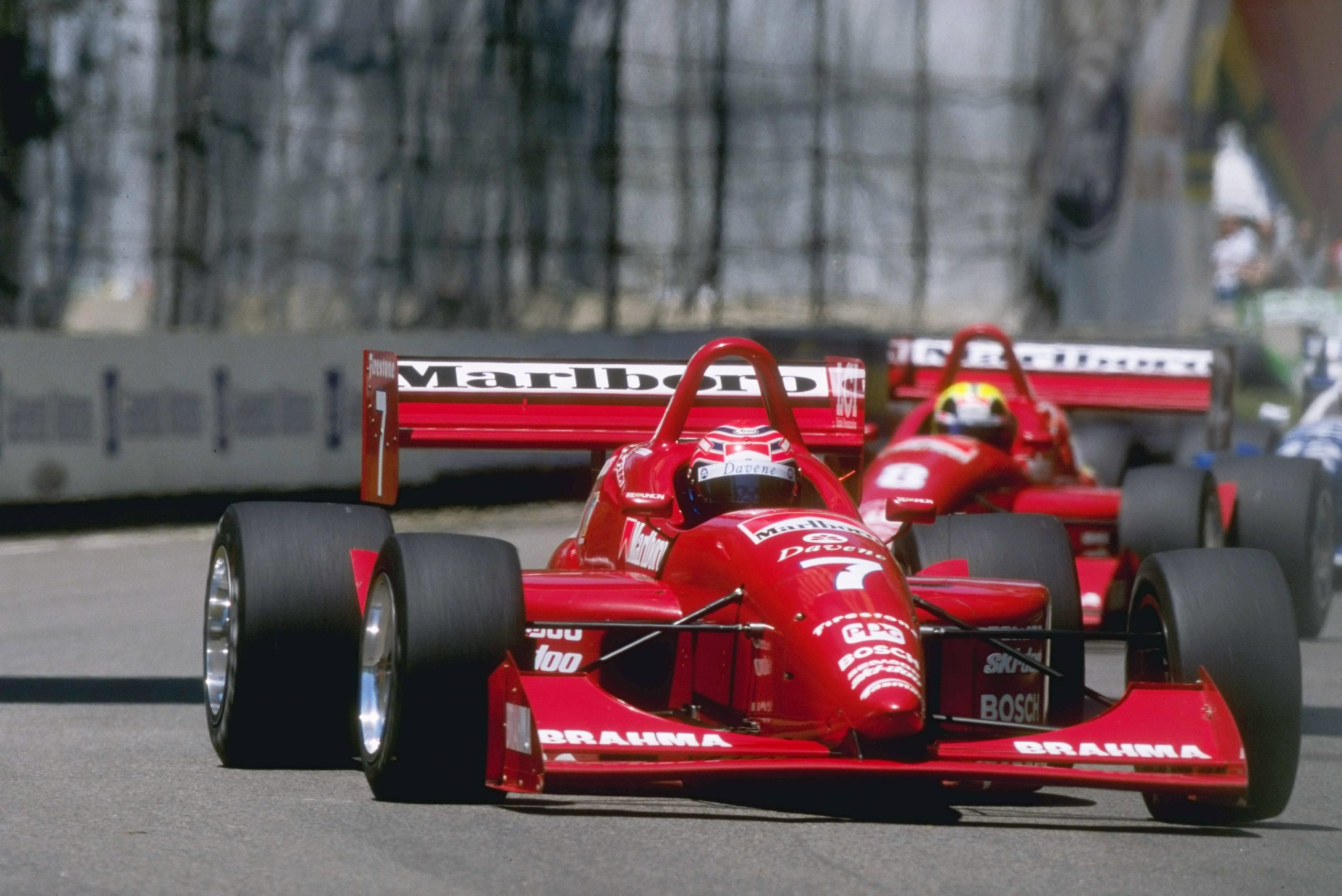 Tony Kanaan leads teammate Helio Castroneves on the streets of Detroit in 1997.