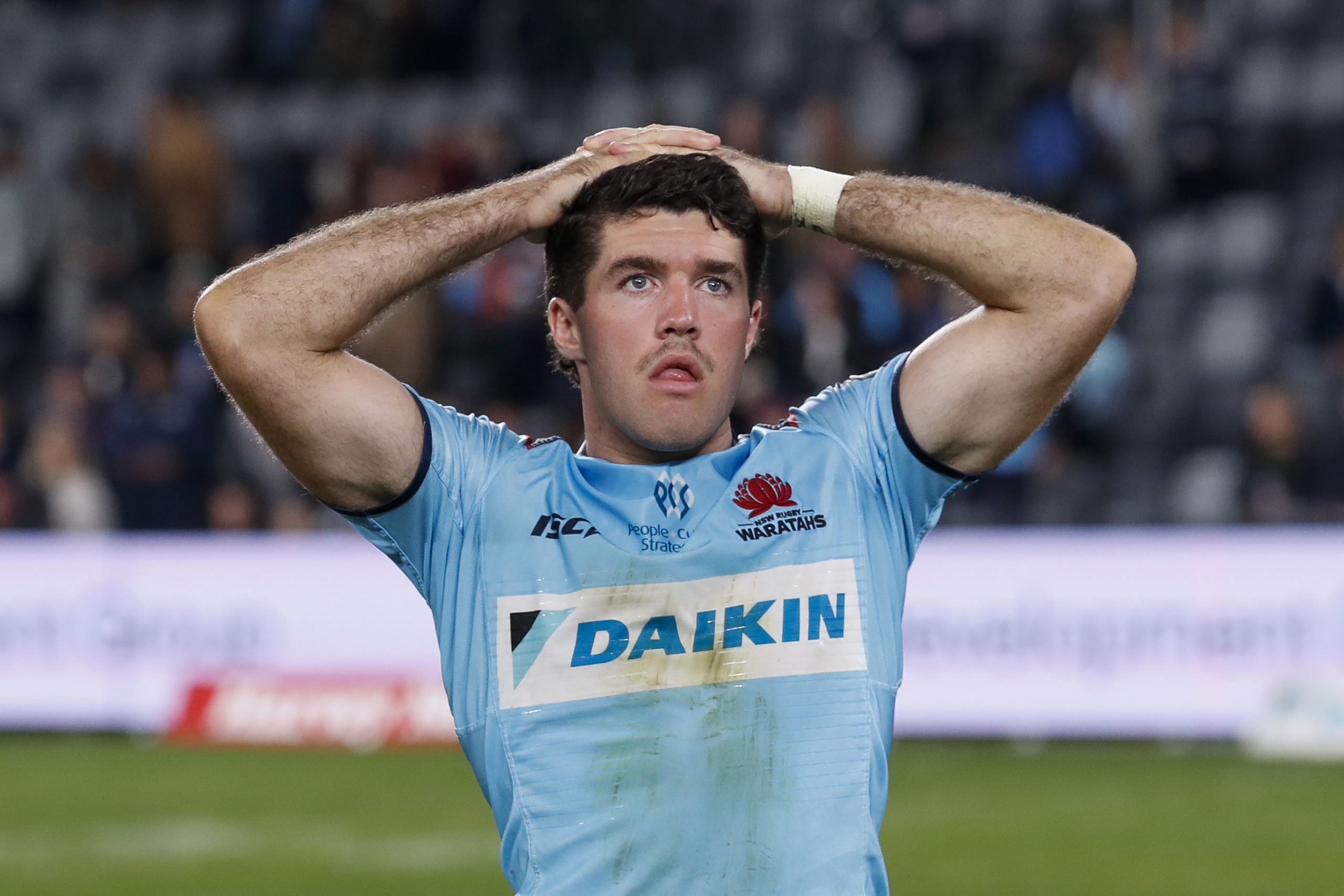 A dejected Ben Donaldson of the Waratahs after they were beaten by the Rebels.