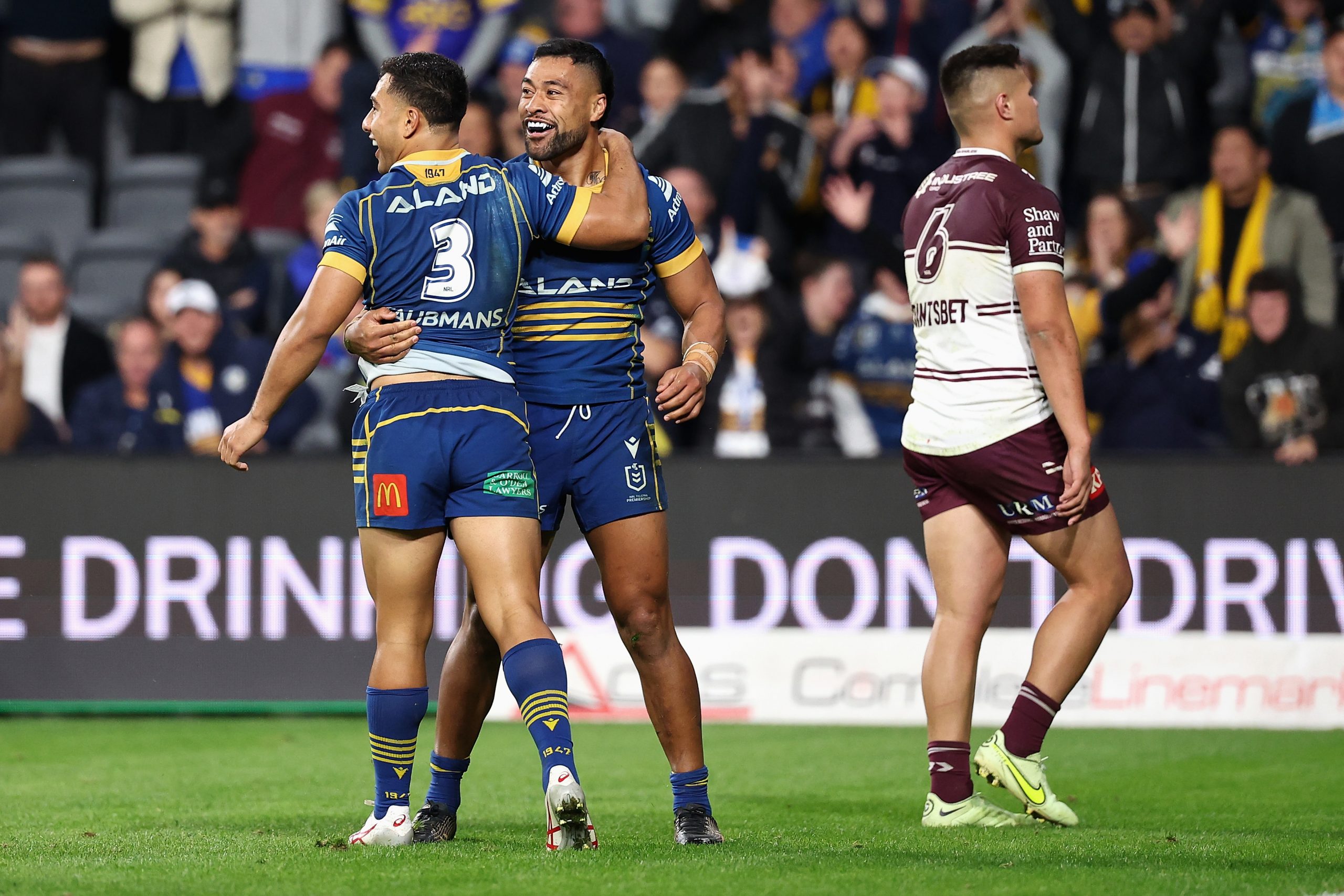 Makahesi Makatoa of the Eels celebrates scoring a try with Will Penisini of the Eels during the round 16 NRL match between Parramatta Eels and Manly Sea Eagles at CommBank Stadium on June 17, 2023 in Sydney, Australia. (Photo by Cameron Spencer/Getty Images)