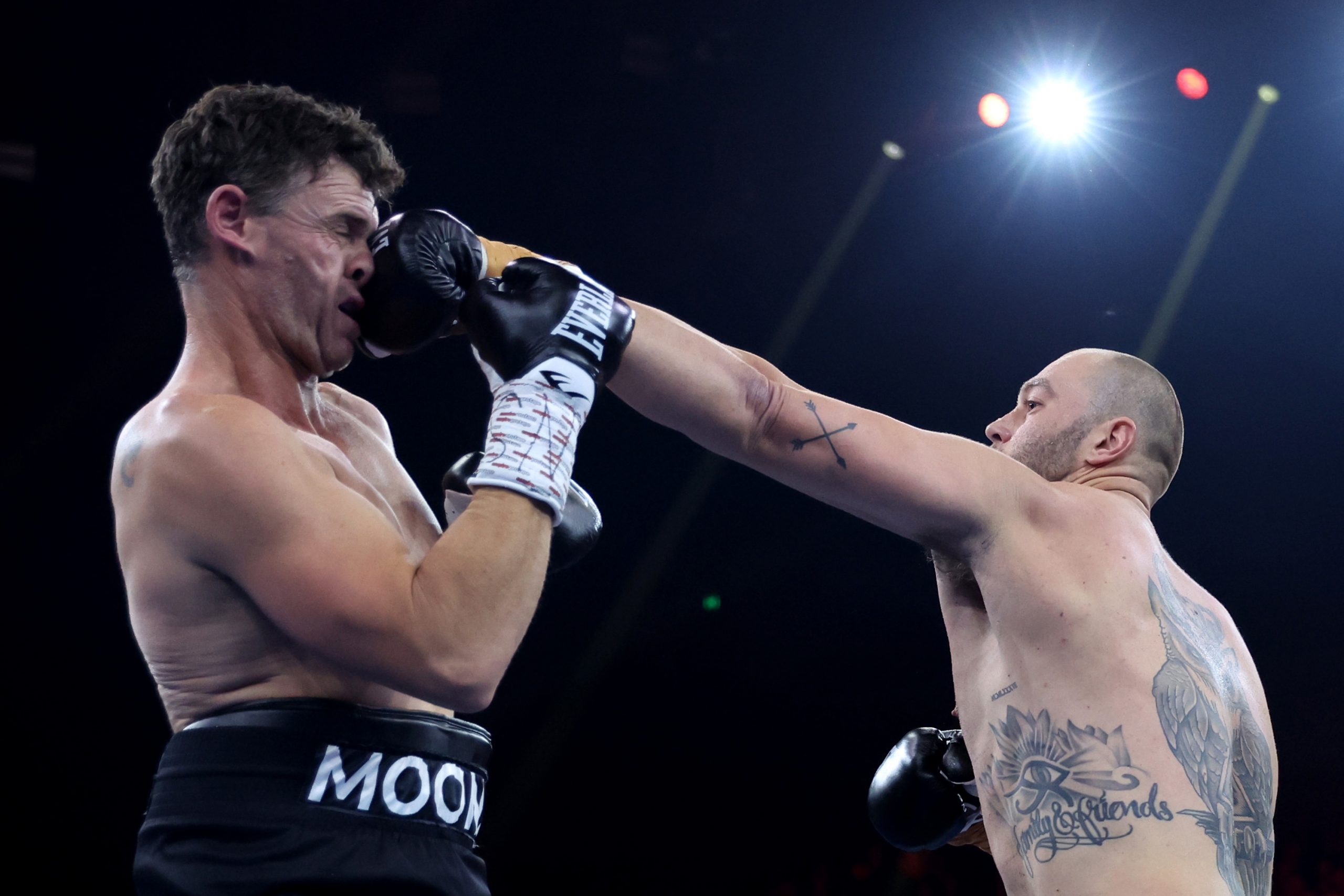 MELBOURNE, AUSTRALIA - MAY 24: Tom Bellchambers (R) punches Cameron Mooney during their Heavyweight bout at Margaret Court Arena on May 24, 2023 in Melbourne, Australia. (Photo by Robert Cianflone/Getty Images)