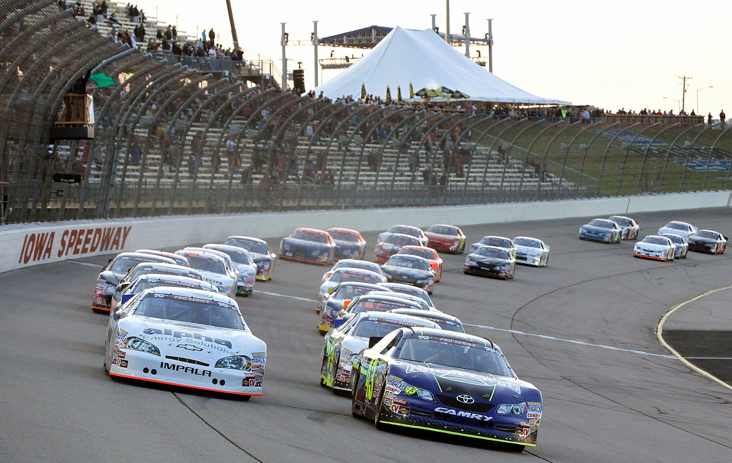 Brodie Kostecki, driver of the No.43 Arcoplate Toyota, leads the field to the green flag during the NASCAR K&N Pro Series at Iowa Speedway om 2014.