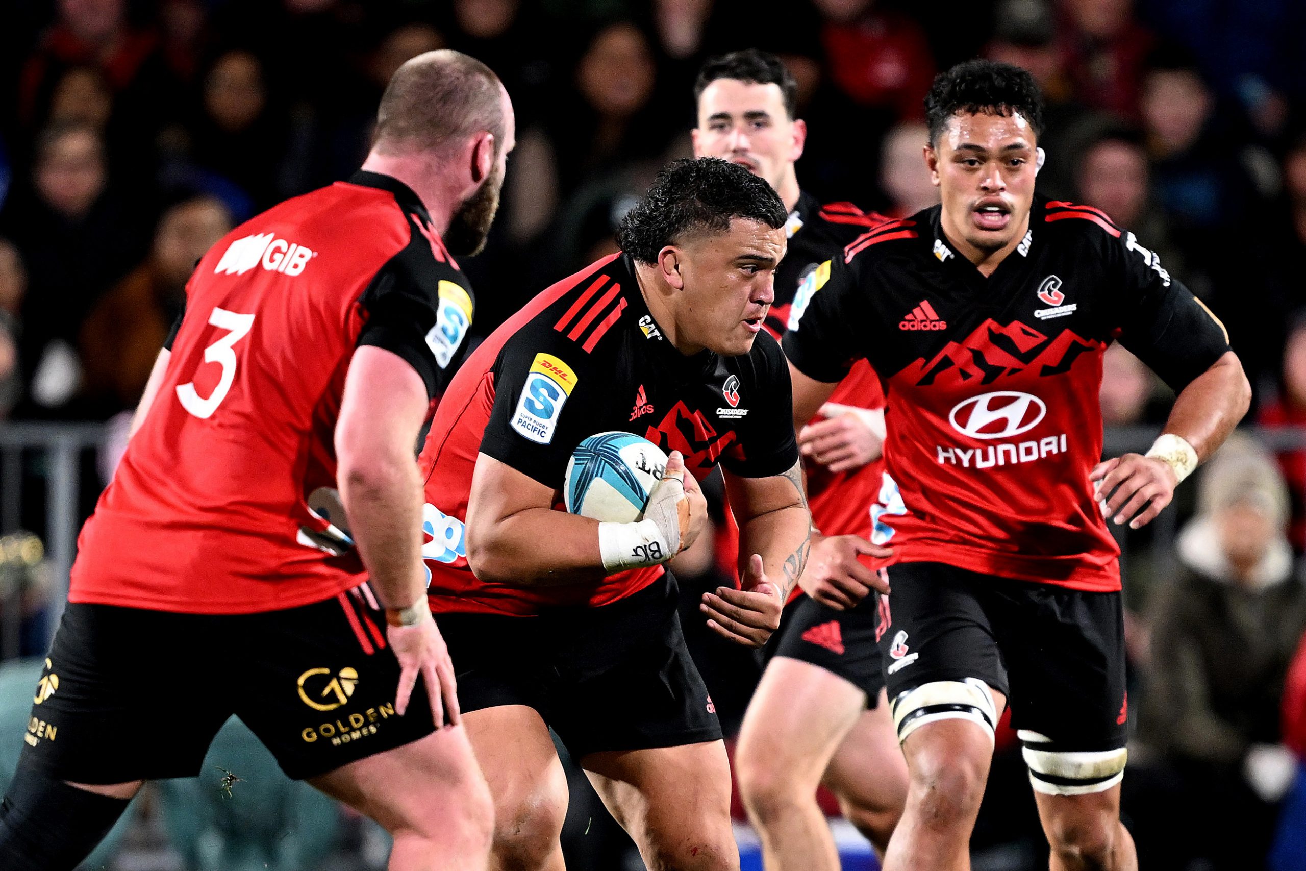 Tamaiti Williams of the Crusaders charges forward.