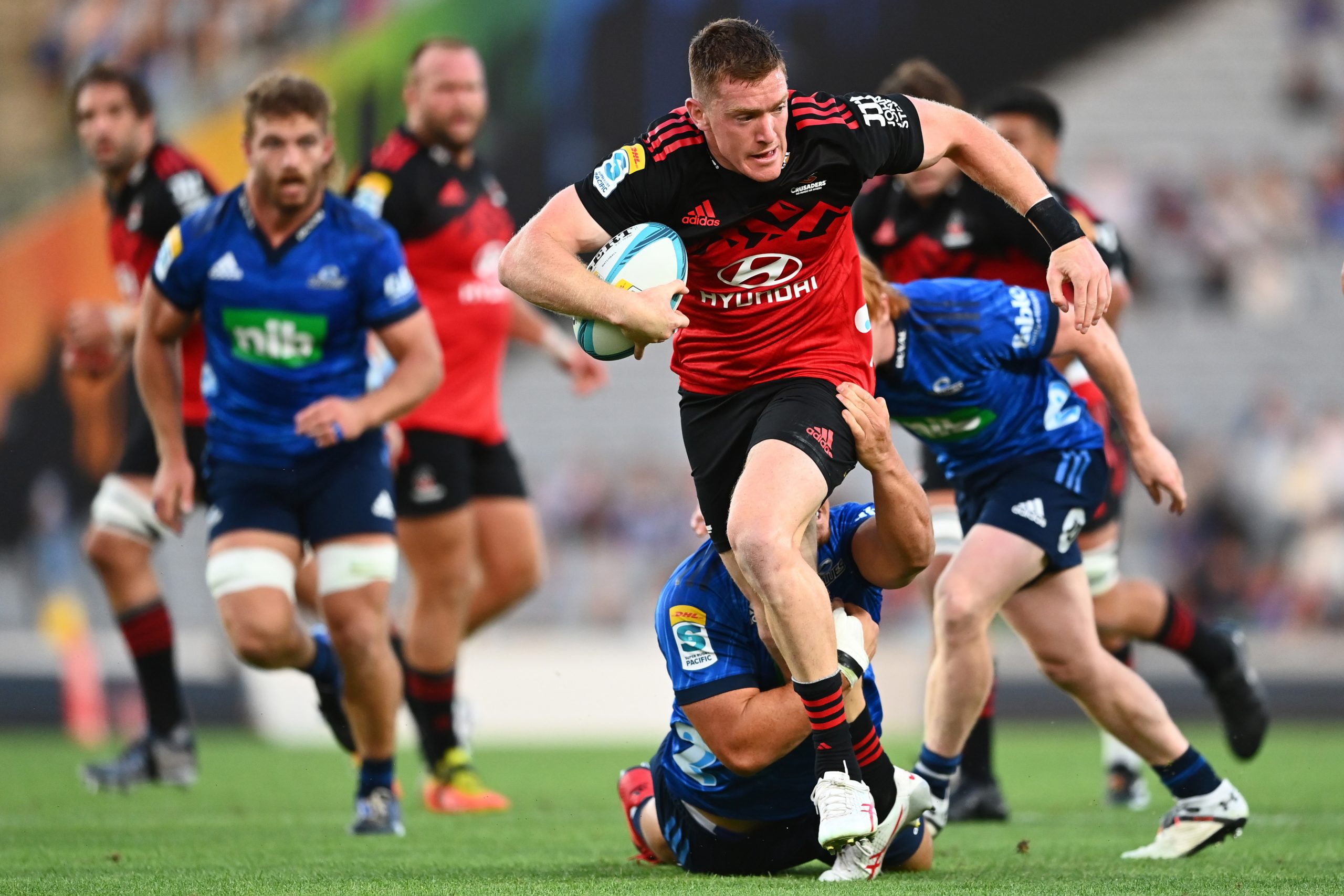 Dallas McLeod of the Crusaders makes a break.