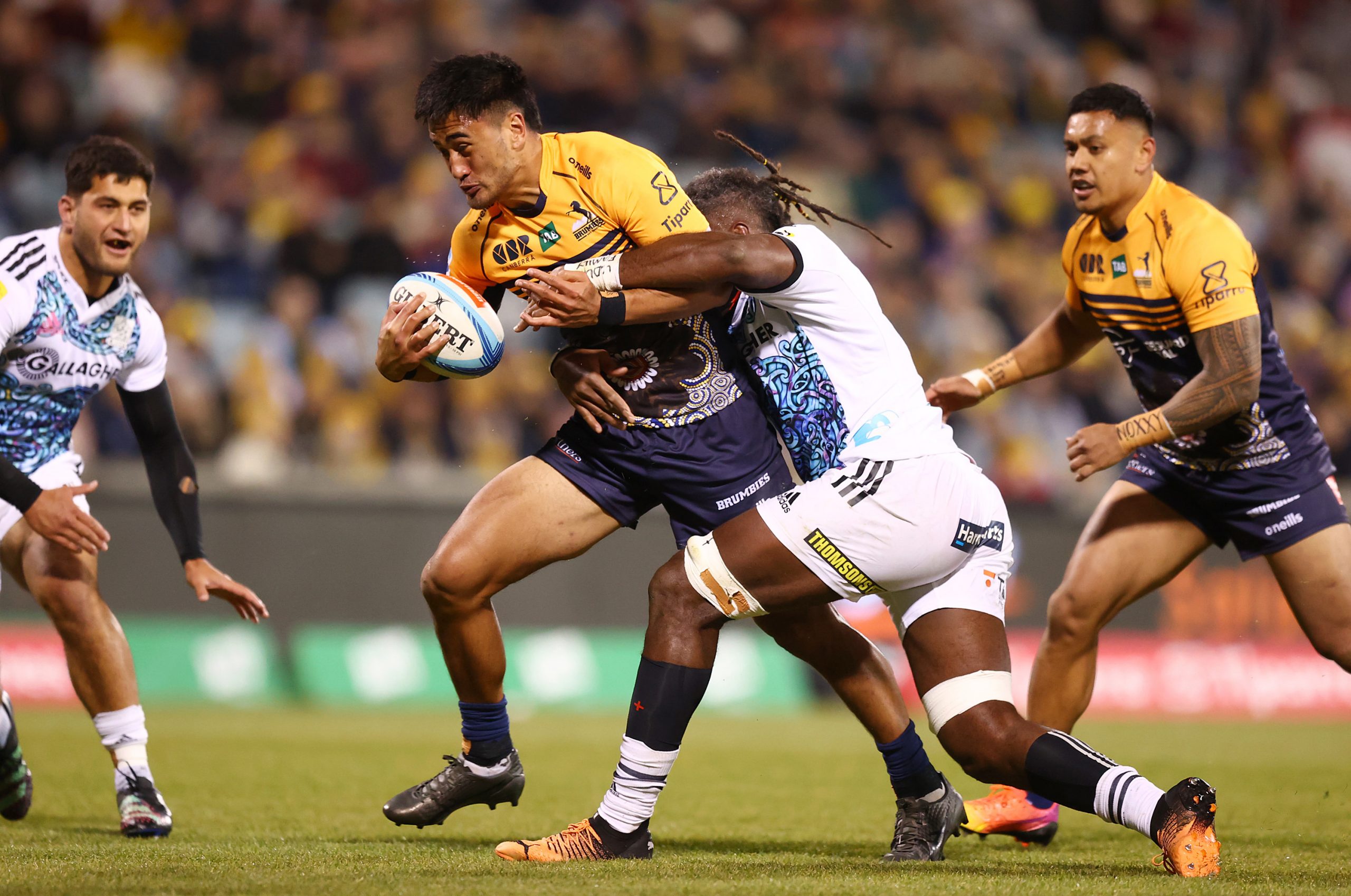 Tamati Tua of the Brumbies in action at GIO Stadium.