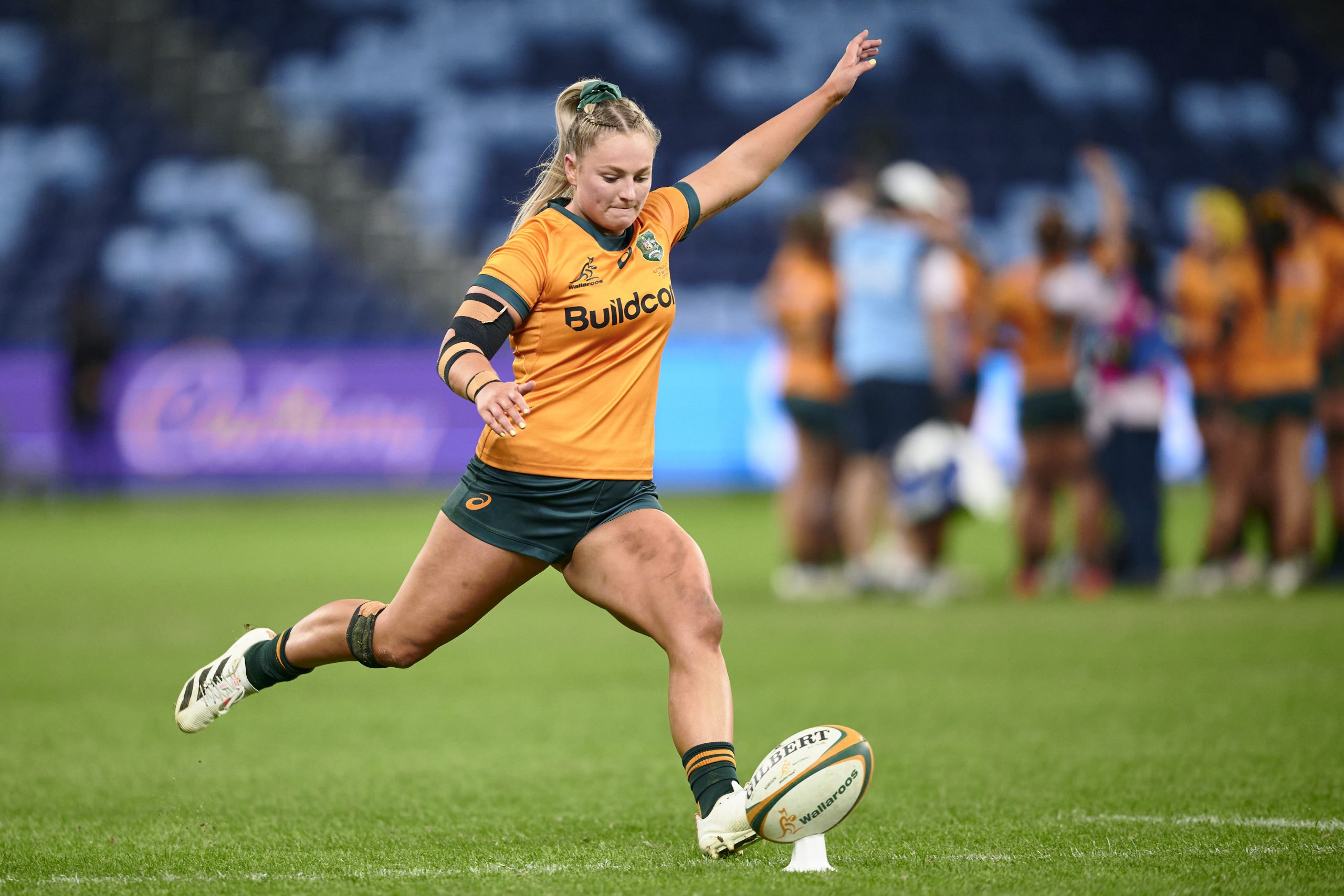 Carys Dallinger kicks during her Wallaroos debut against Fiji.