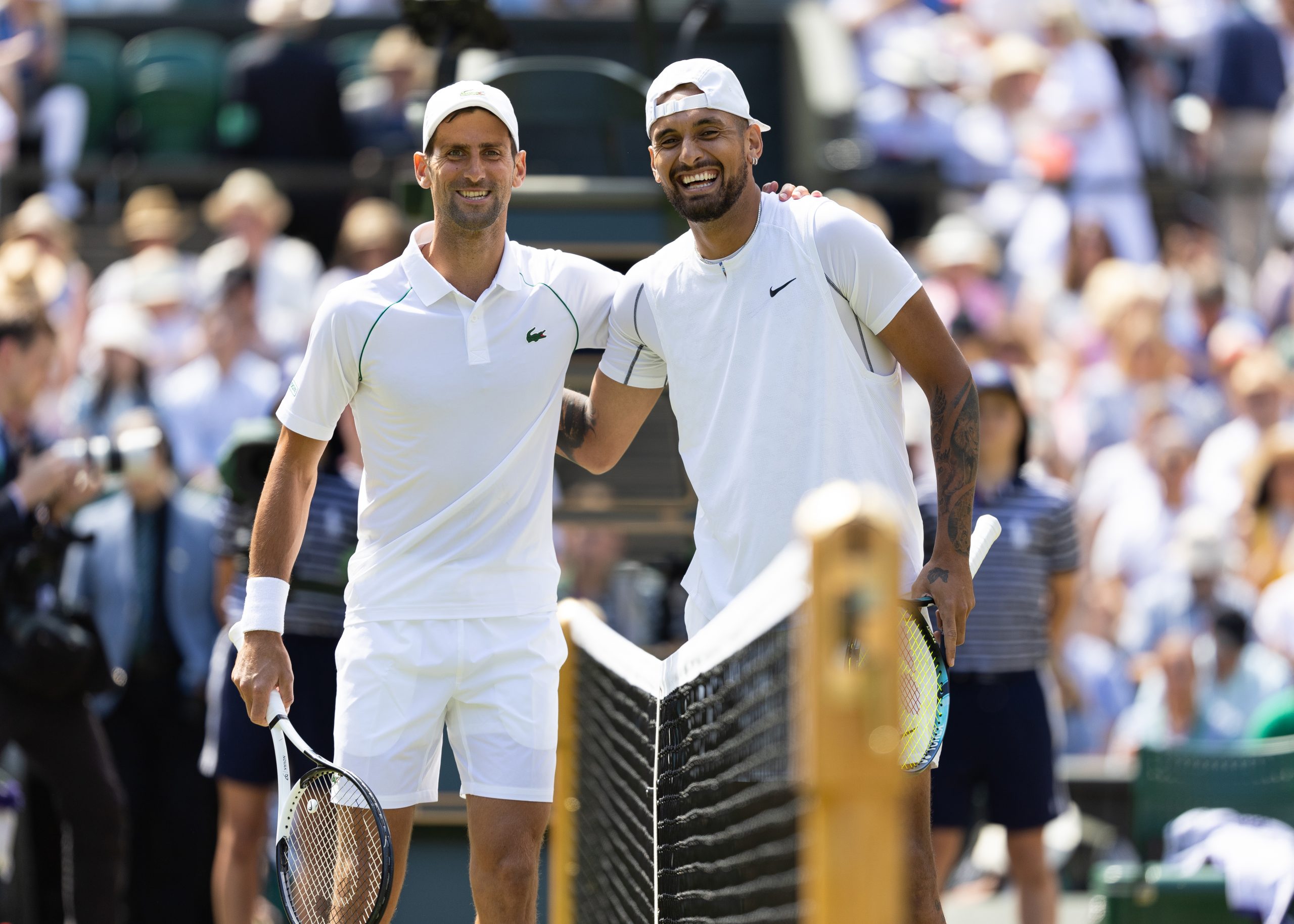 Novak Djokovic and Nick Kyrgios pose before the final at Wimbledon. 