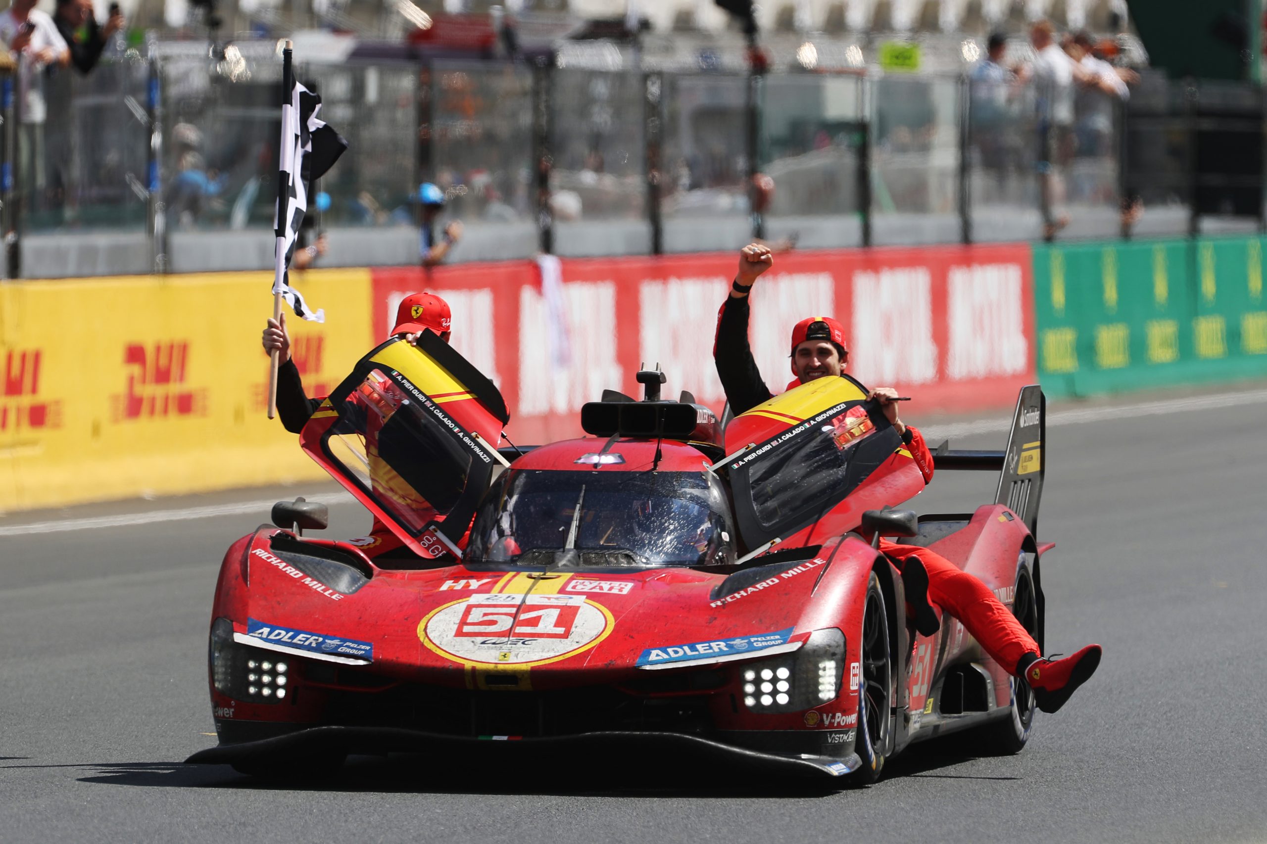 Ferrari and its drivers celebrate winning the 24 Hours of Le Mans.