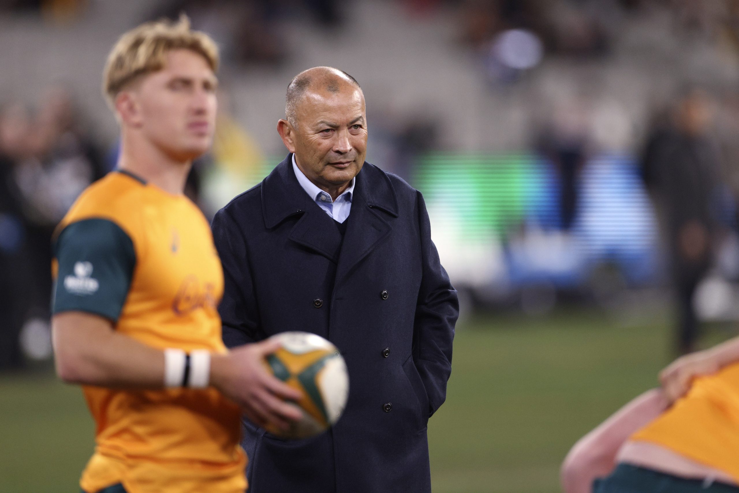 Australia's head coach Eddie Jones watches his team warm-up before their Bledisloe Cup Test.