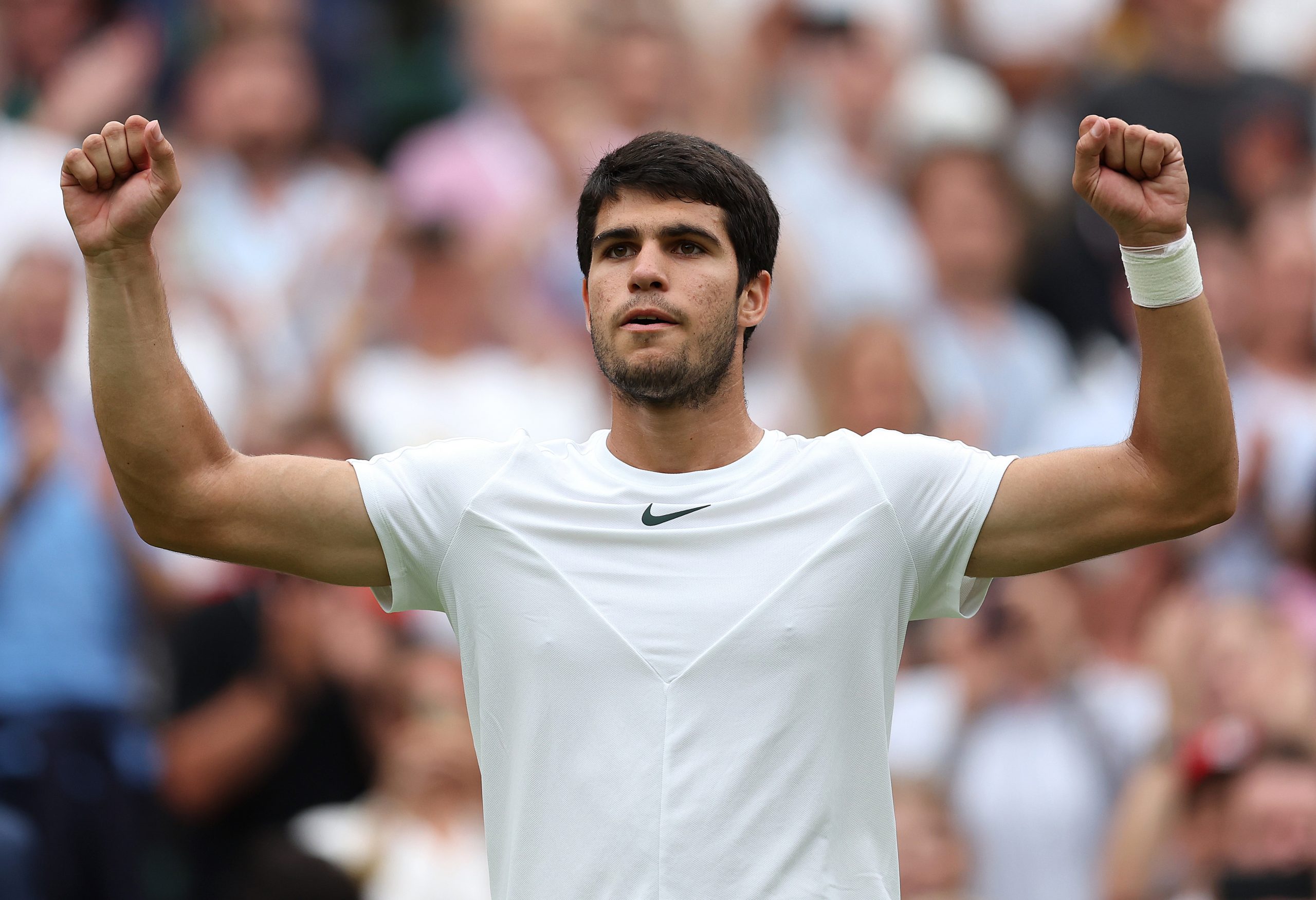 Carlos Alcaraz of Spain celebrates after defeating Nicolas Jarry of Chile in the third round.