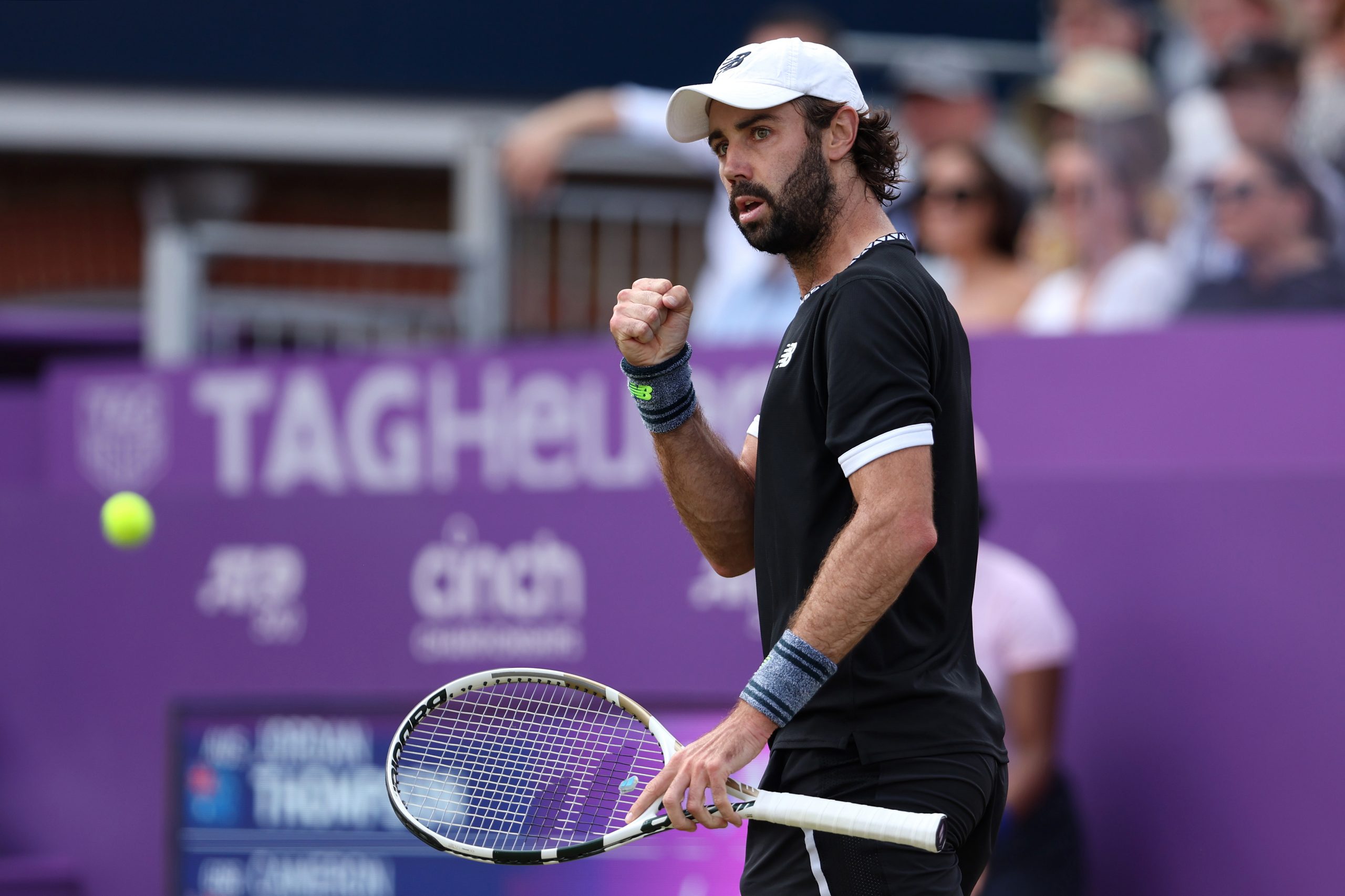 Jordan Thompson of Australia celebrates a point against Cameron Norrie 
