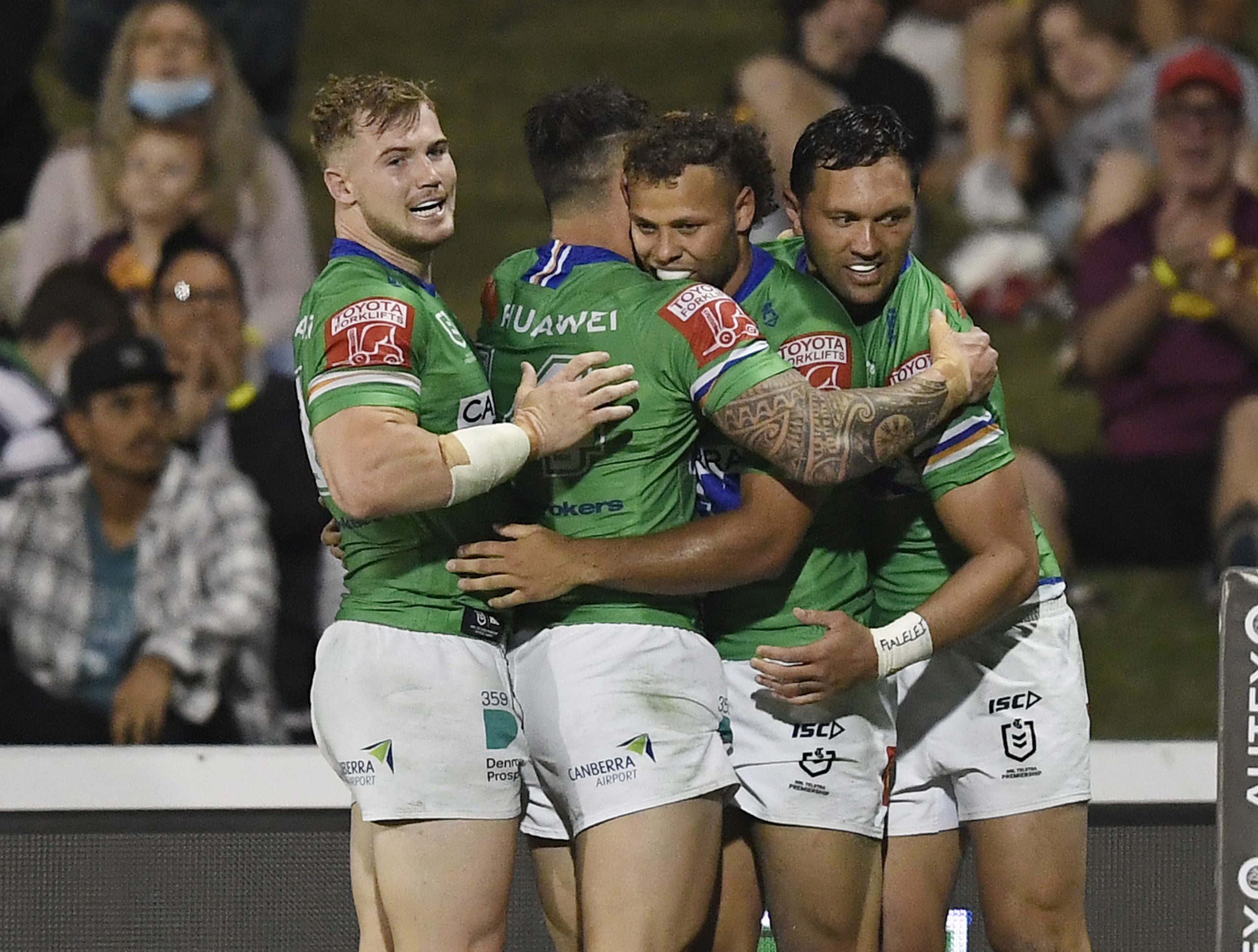 Sebastian Kris of the Raiders  celebrates after scoring a try.