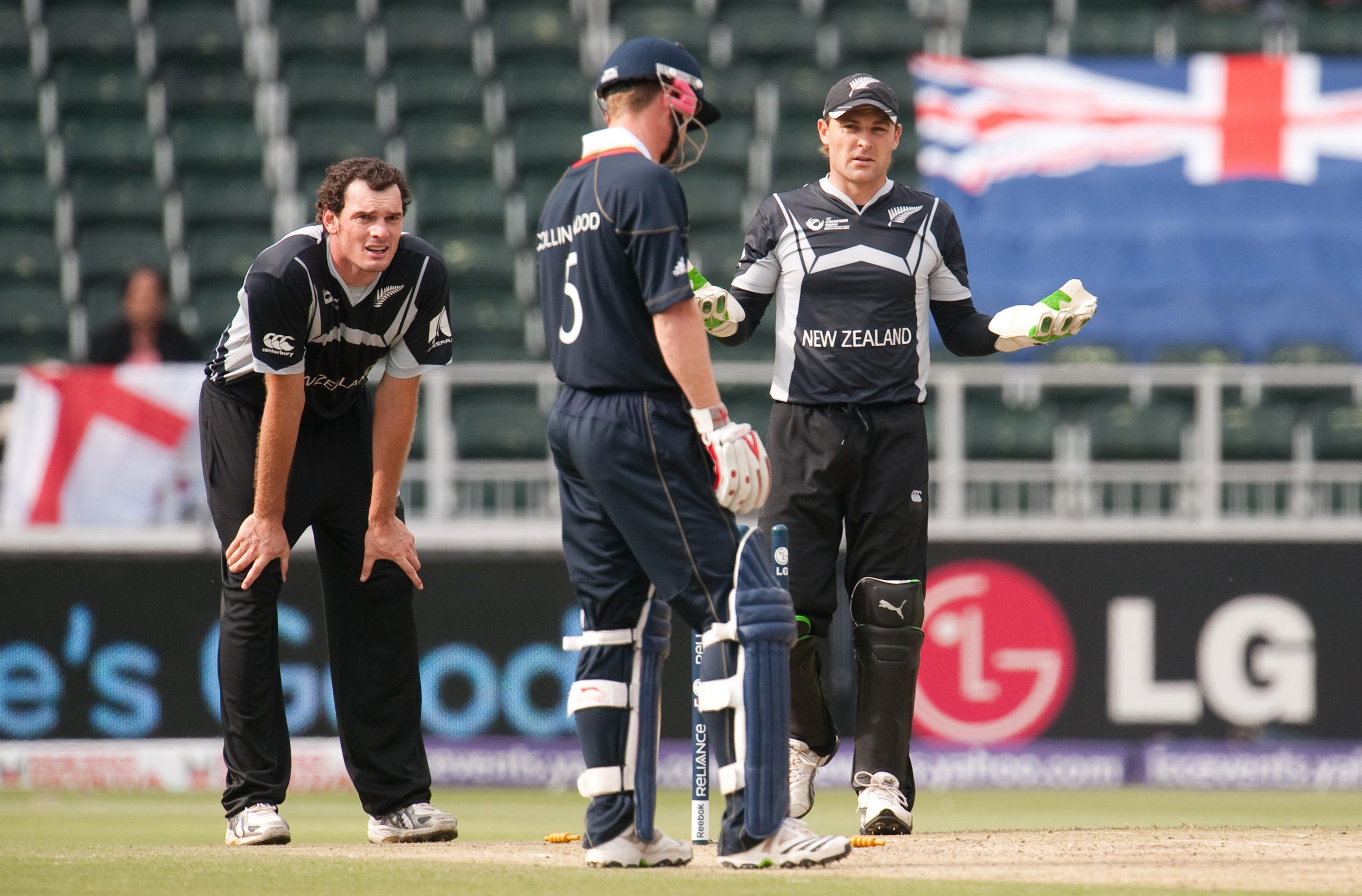 England's Paul Collingwood with New Zealand wicket keeper Brendon McCullum after he was given 'run out' by the third umpire, New Zealand captain Daniel Vettori then withdrew the appeal.