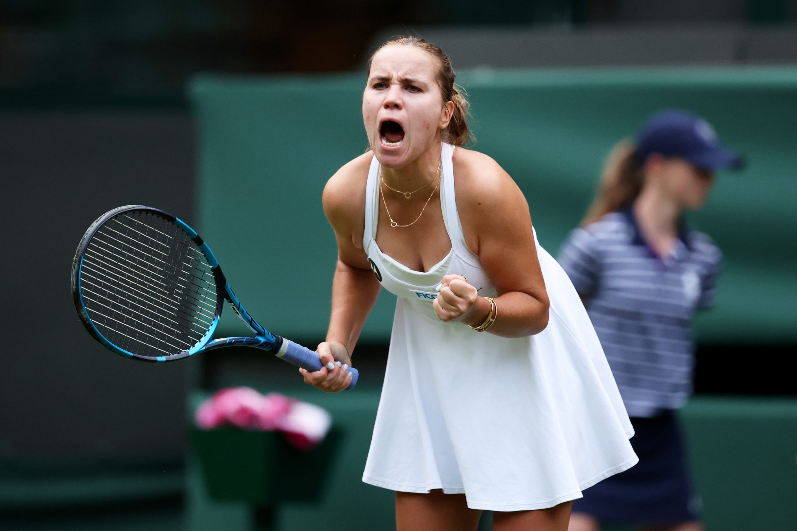 Sofia Kenin celebrates against Coco Gauff in the women's singles first round match during day one of Wimbledon.