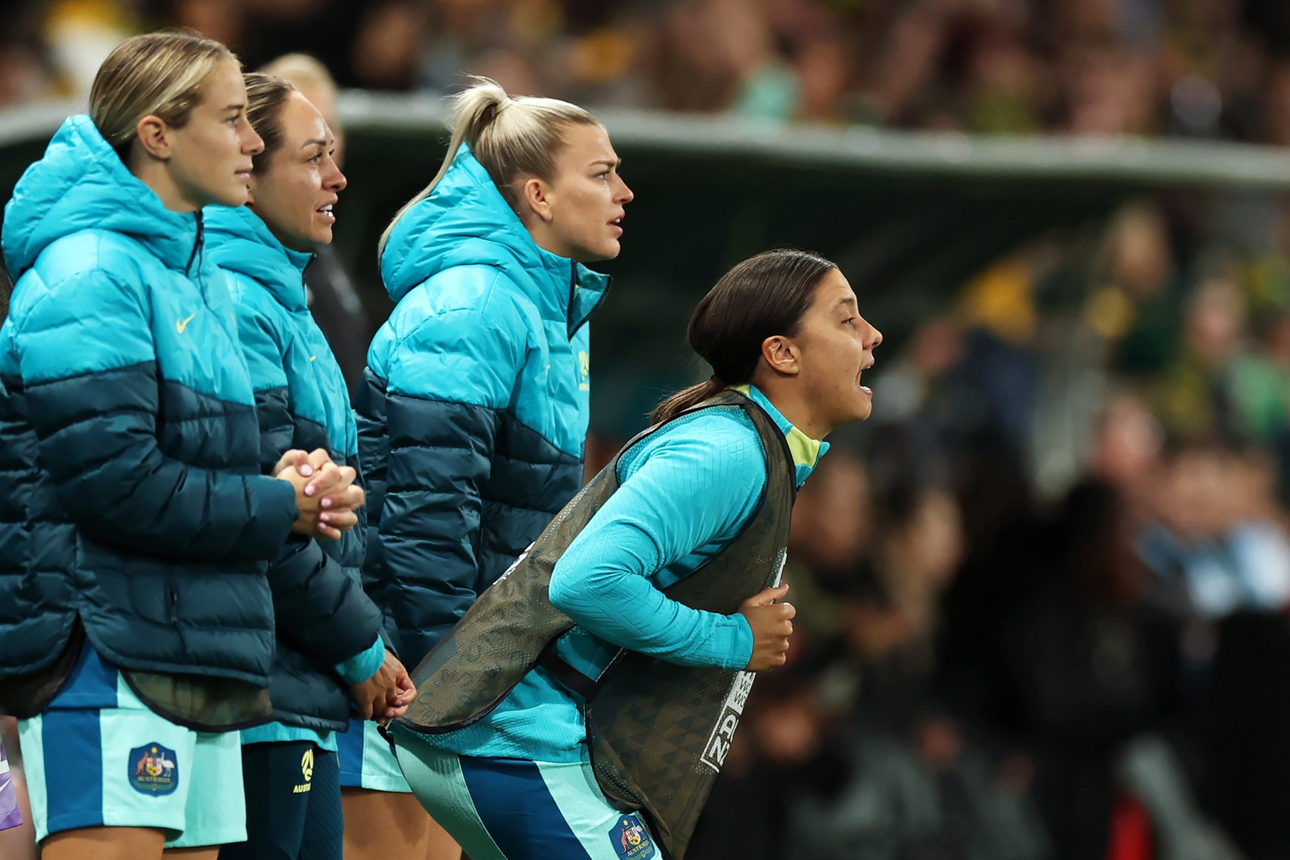 MELBOURNE, AUSTRALIA - JULY 31: Sam Kerr (1st R) of Australia celebrates her team's first goal scored by Hayley Raso (not pictured) during the FIFA Women's World Cup Australia & New Zealand 2023 Group B match between Canada and Australia at Melbourne Rectangular Stadium on July 31, 2023 in Melbourne, Australia. (Photo by Cameron Spencer/Getty Images)