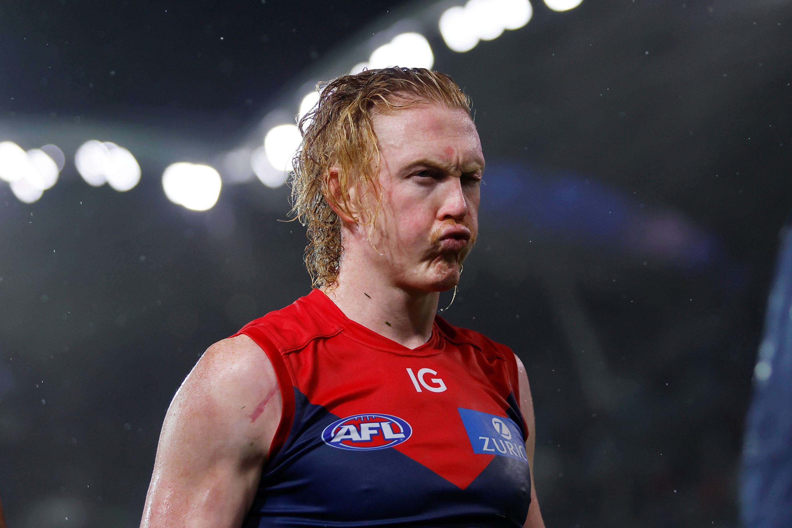 ADELAIDE, AUSTRALIA - APRIL 15: Clayton Oliver of the Demons leaves the field after a loss during the 2023 AFL Round 05 match between the Essendon Bombers and the Melbourne Demons at Adelaide Oval on April 15, 2023 in Adelaide, Australia. (Photo by Dylan Burns/AFL Photos)