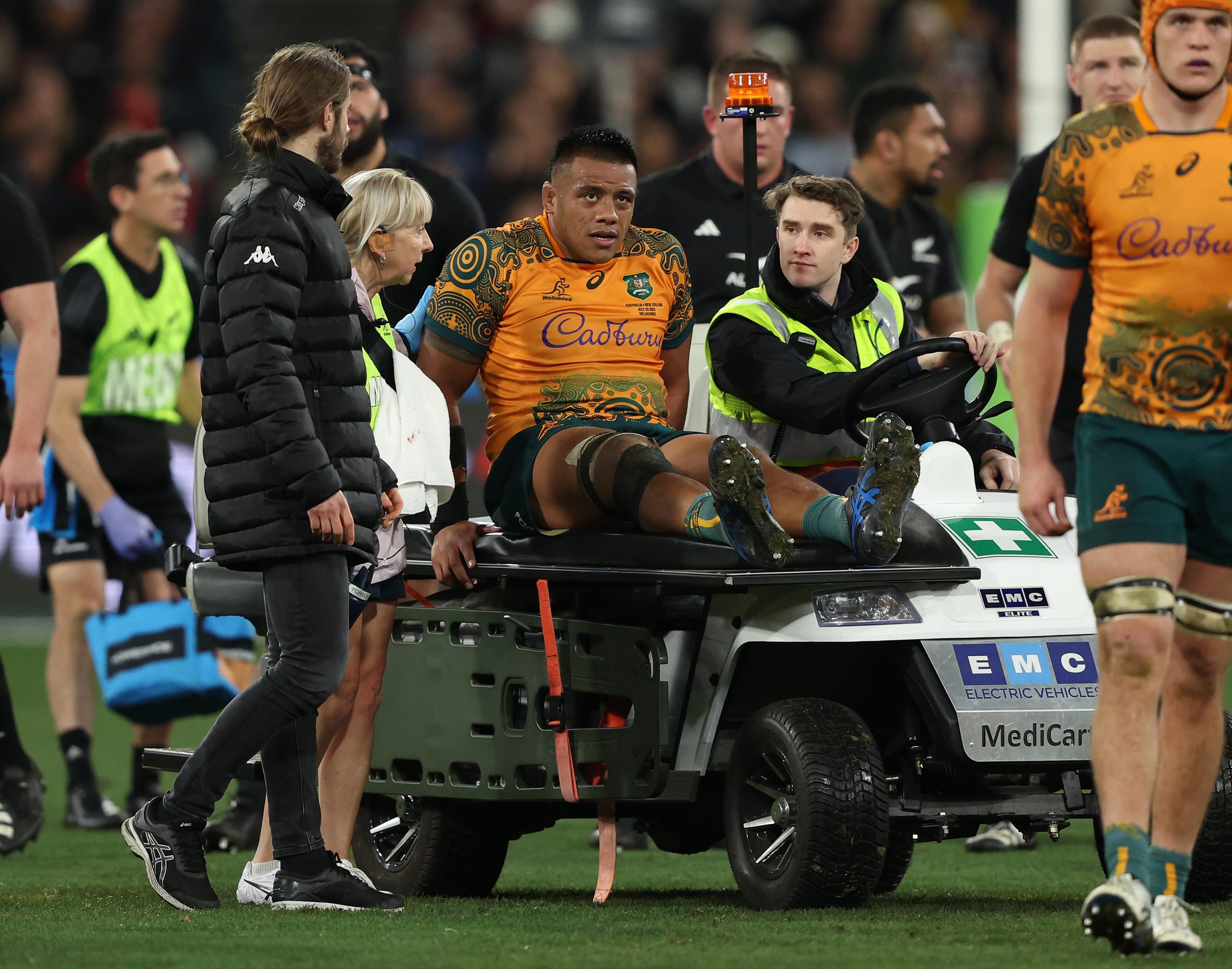 Allan Alaalatoa of the Wallabies comes off the ground with an injury.