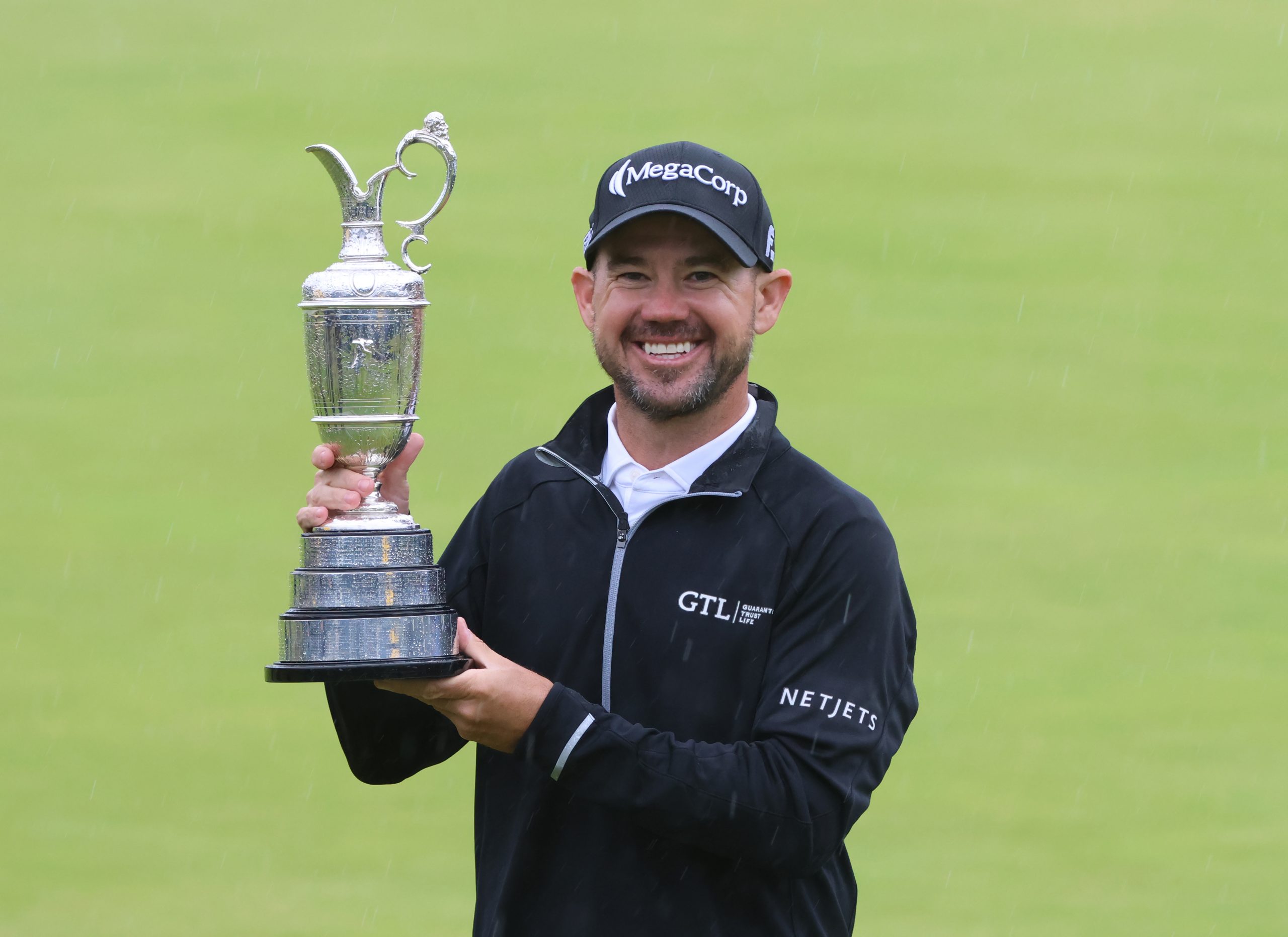 American Brian Harman holds the Claret jug after winning the 151st Open at Royal Liverpool Golf Club on July 23, 2023 in Hoylake, England. (Photo by MB Media/Getty Images)