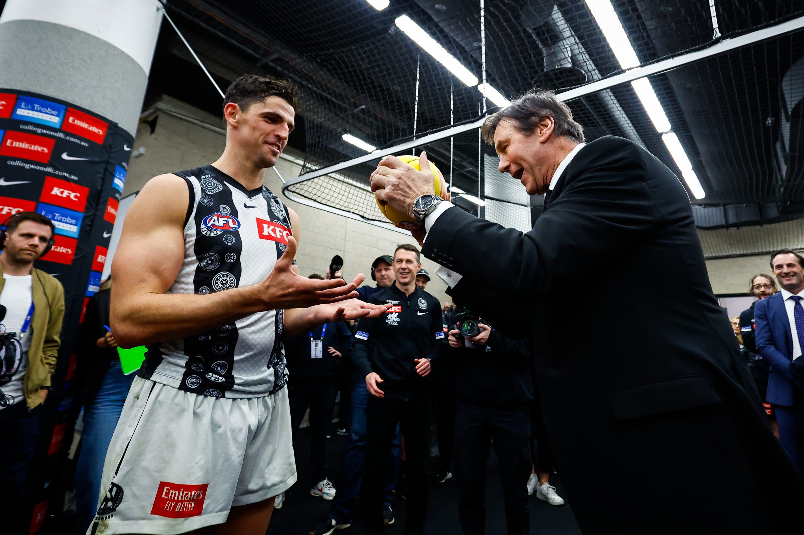 Collingwood President Jeff Browne presents the match ball to Scott Pendlebury of the Magpies after he broke the league record for the most possessions during the 2023 AFL Round 17 match between the Western Bulldogs and the Collingwood Magpies at Marvel Stadium on July 7, 2023 in Melbourne, Australia. (Photo by Dylan Burns/AFL Photos via Getty Images)