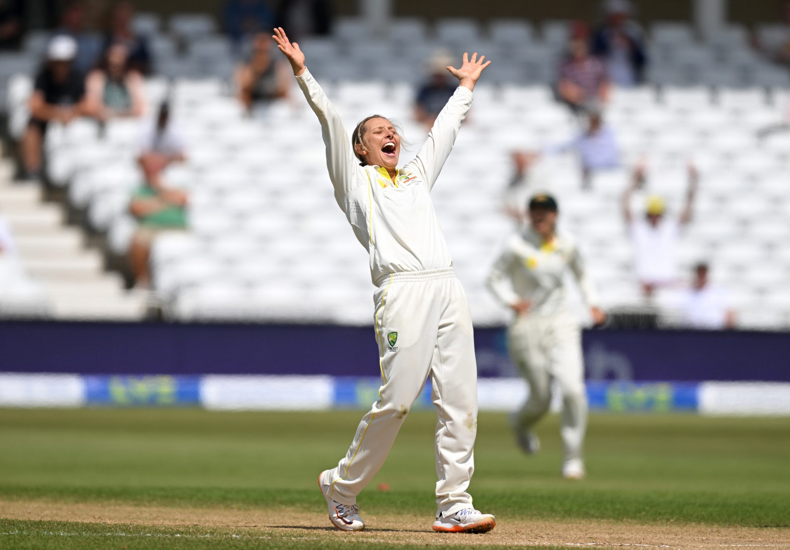 Ashleigh Gardner celebrates taking the final wicket of Danni Wyatt to win the Women's Ashes Test at Trent Bridge.