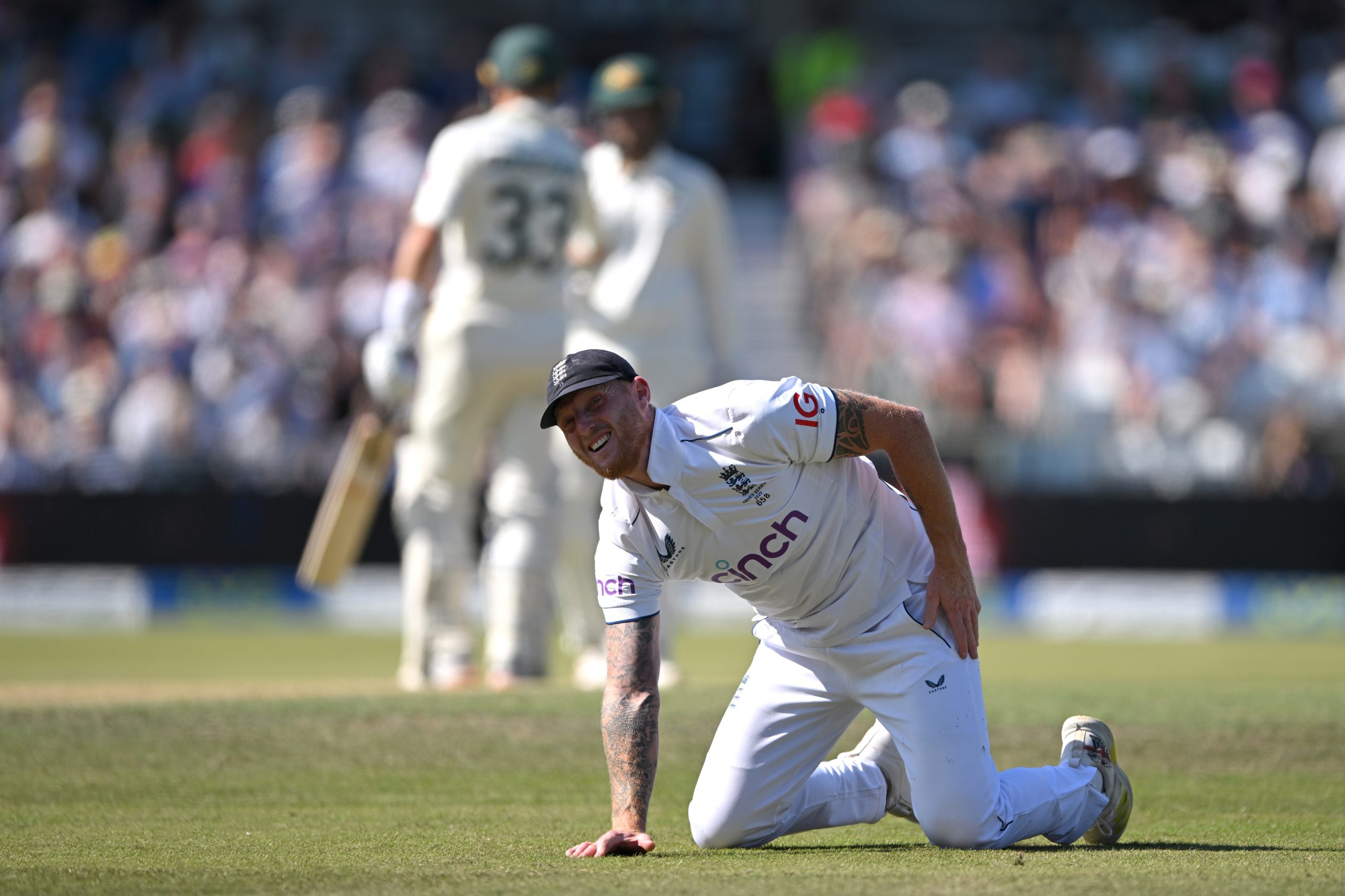 Ben Stokes clutches his strained glute while fielding in the second innings.