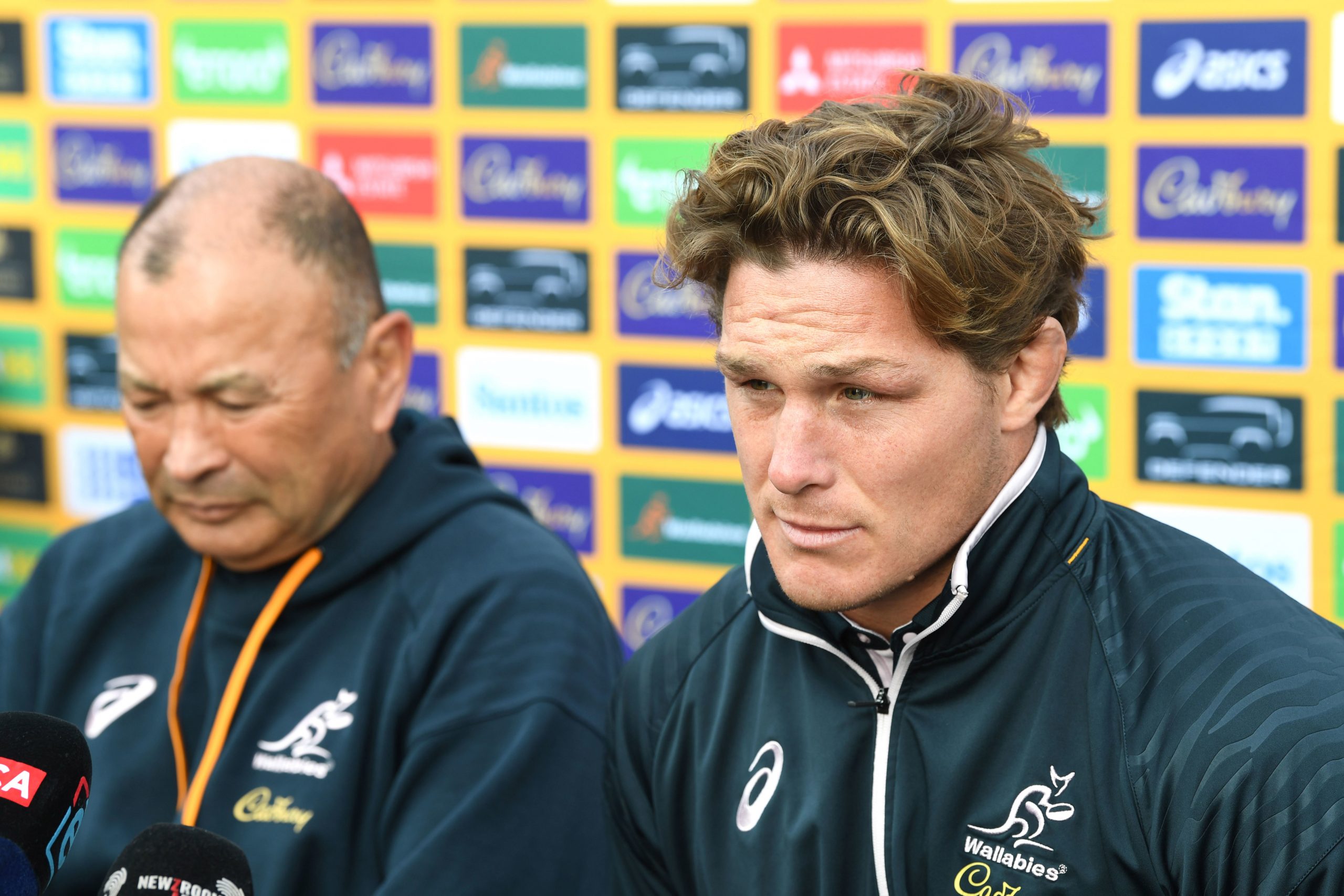 Wallabies head coach Eddie Jones (left) with co-captain Michael Hooper.