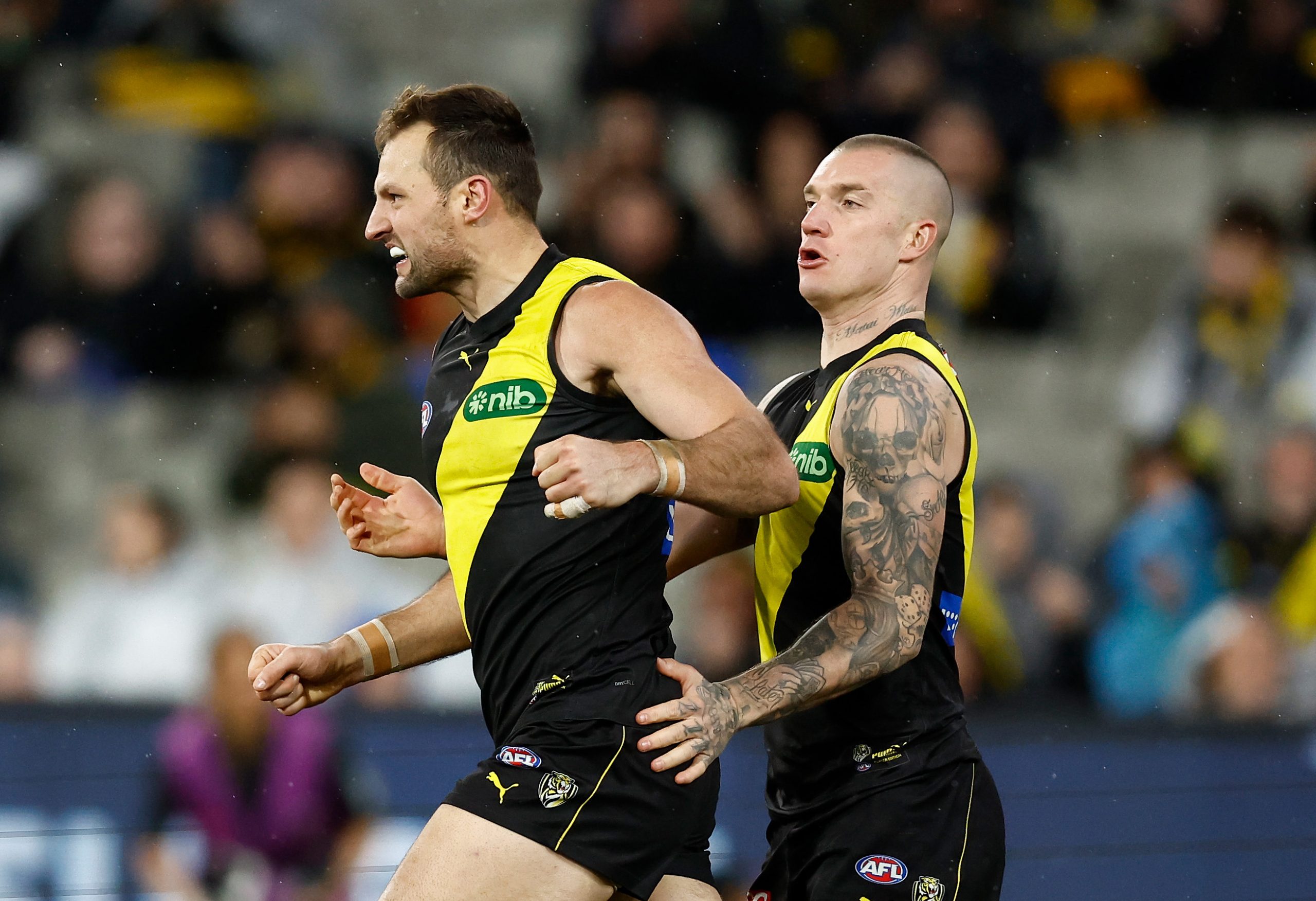 MELBOURNE, AUSTRALIA - JULY 06: Toby Nankervis (left) and Dustin Martin of the Tigers celebrate during the 2023 AFL Round 17 match between the Richmond Tigers and the Sydney Swans at the Melbourne Cricket Ground on July 6, 2023 in Melbourne, Australia. (Photo by Michael Willson/AFL Photos via Getty Images)