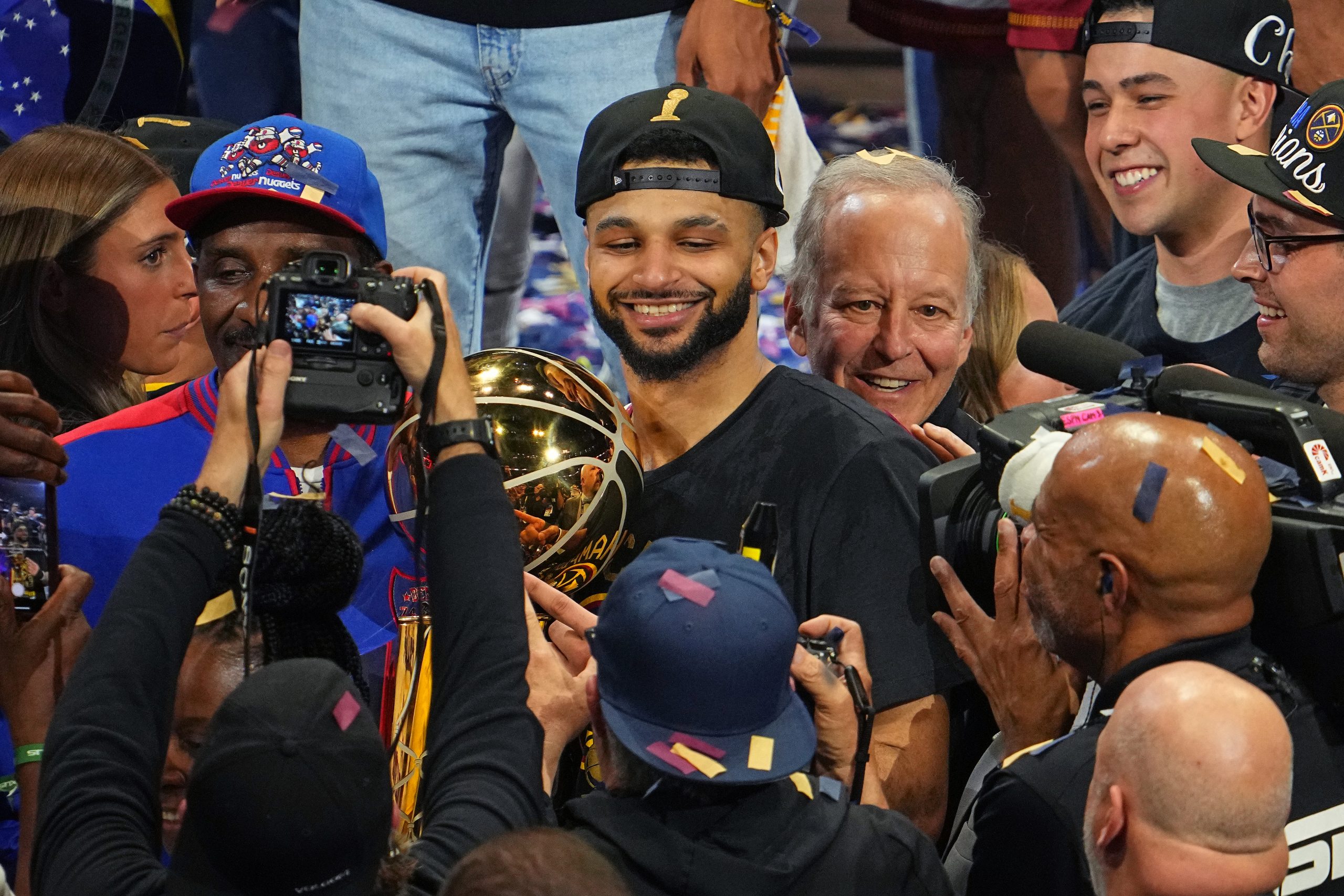 DENVER, CO - JUNE 12: David Thompson talks with Jamal Murray #27 of the Denver Nuggets after winning during Game Five of the 2023 NBA Finals on June 12, 2023 at the Ball Arena in Denver, Colorado. NOTE TO USER: User expressly acknowledges and agrees that, by downloading and/or using this Photograph, user is consenting to the terms and conditions of the Getty Images License Agreement. Mandatory Copyright Notice: Copyright 2023 NBAE (Photo by Bart Young/NBAE via Getty Images)