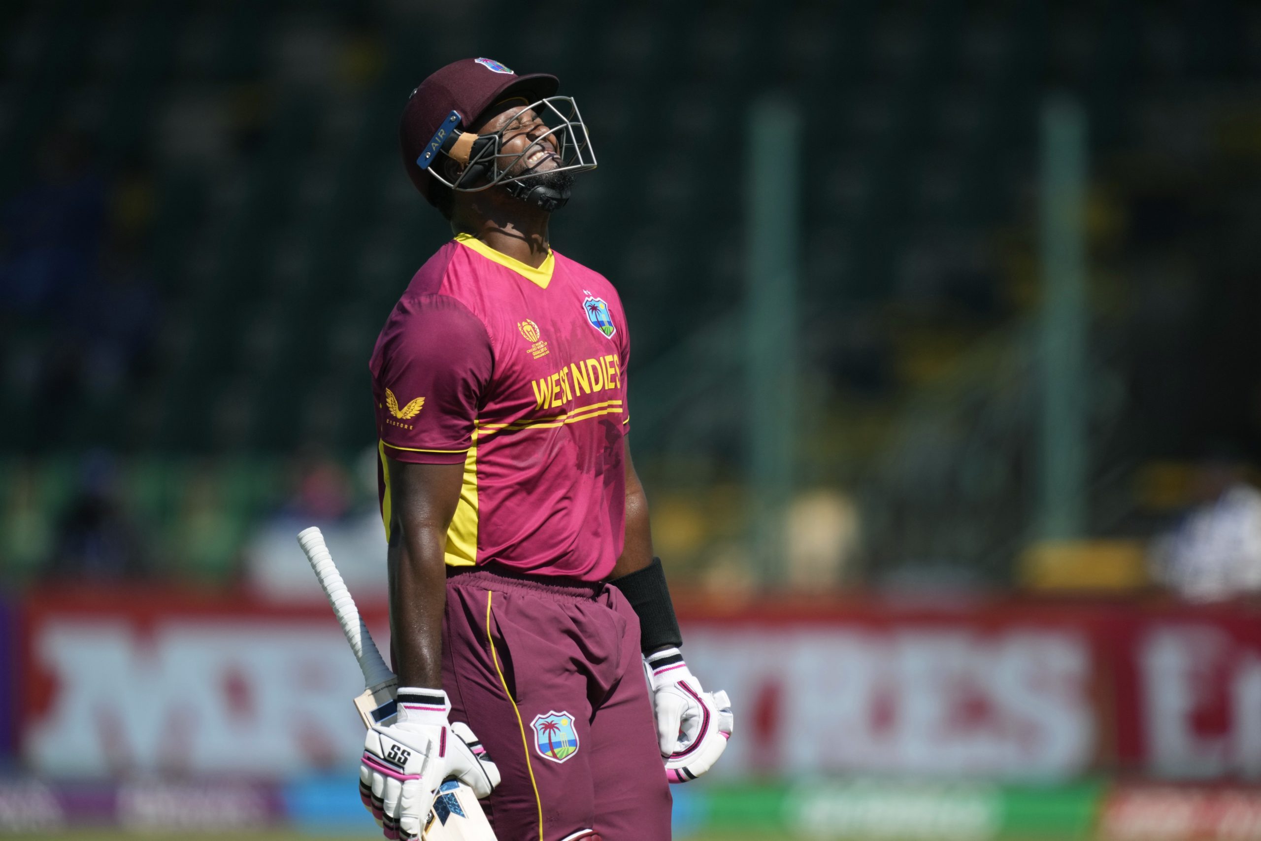 West Indies' Romario Shepherd reacts after been dismissed during the CC Men's Cricket World Cup Qualifier match between the West Indies and Scotland.