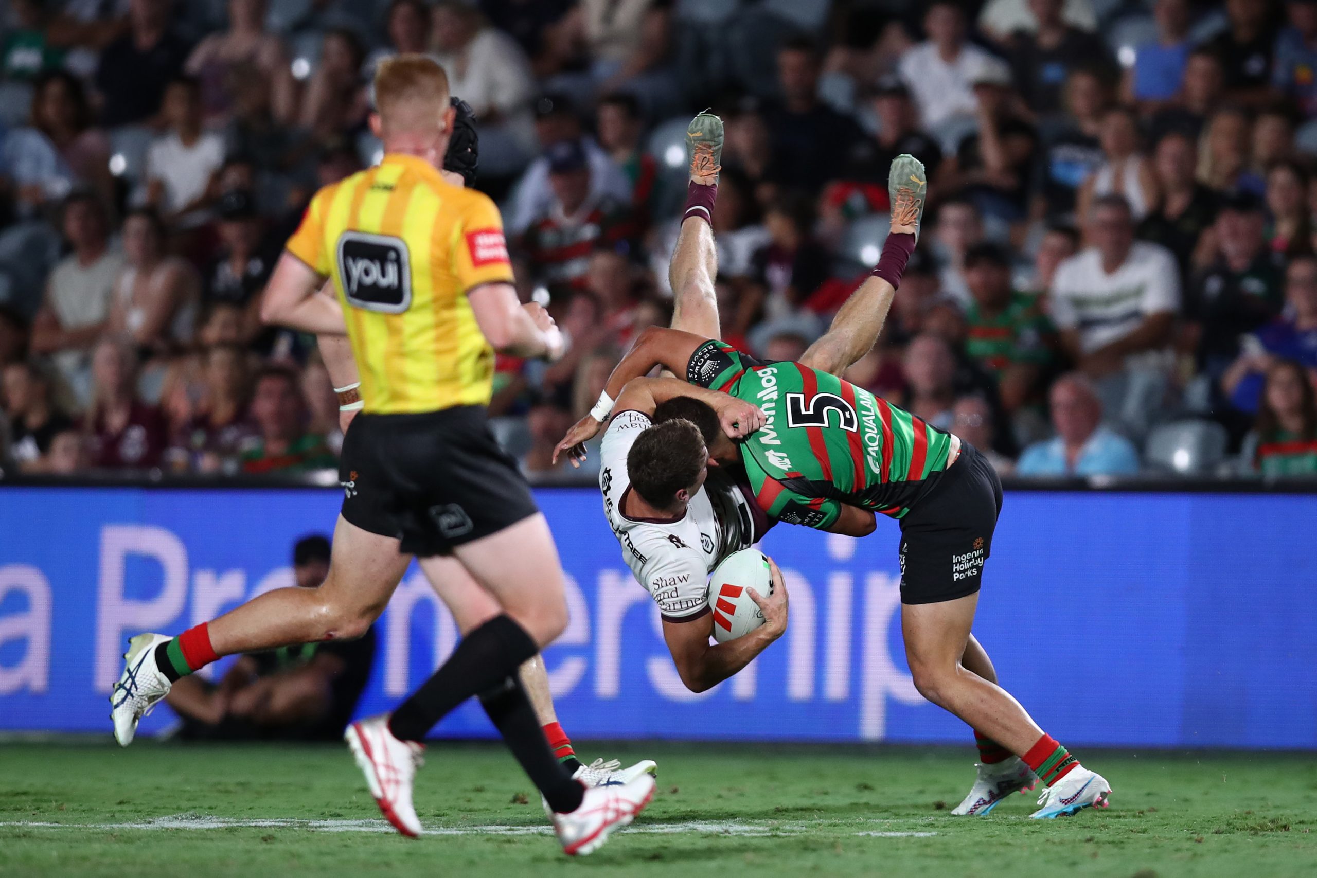 Fletcher Myers of the Sea Eagles is tackled by Leon Te Hau of the Rabbitohs during the South Sydney Rabbitohs and the Manly Sea Eagles at Industree Group Stadium on February 10, 2023 in Gosford, Australia. (Photo by Jason McCawley/Getty Images)