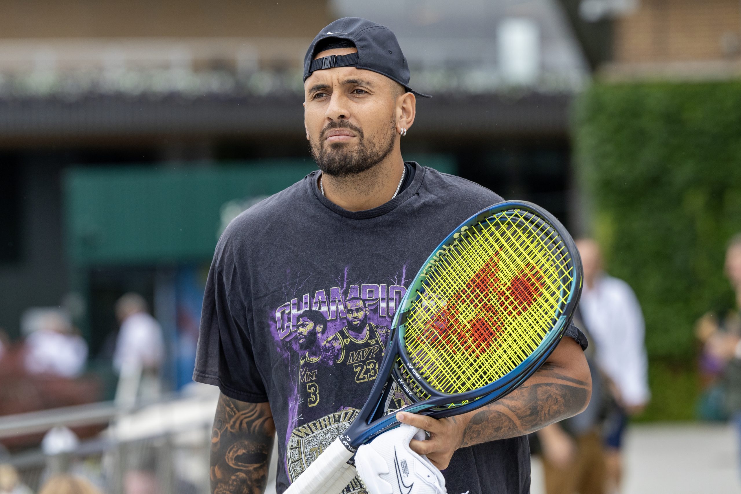 LONDON, ENGLAND - JUNE 30.  Nick Kyrgios of Australia heads for training on the practice courts in preparation for the Wimbledon Lawn Tennis Championships at the All England Lawn Tennis and Croquet Club at Wimbledon on June 30, 2023, in London, England. (Photo by Tim Clayton/Corbis via Getty Images)