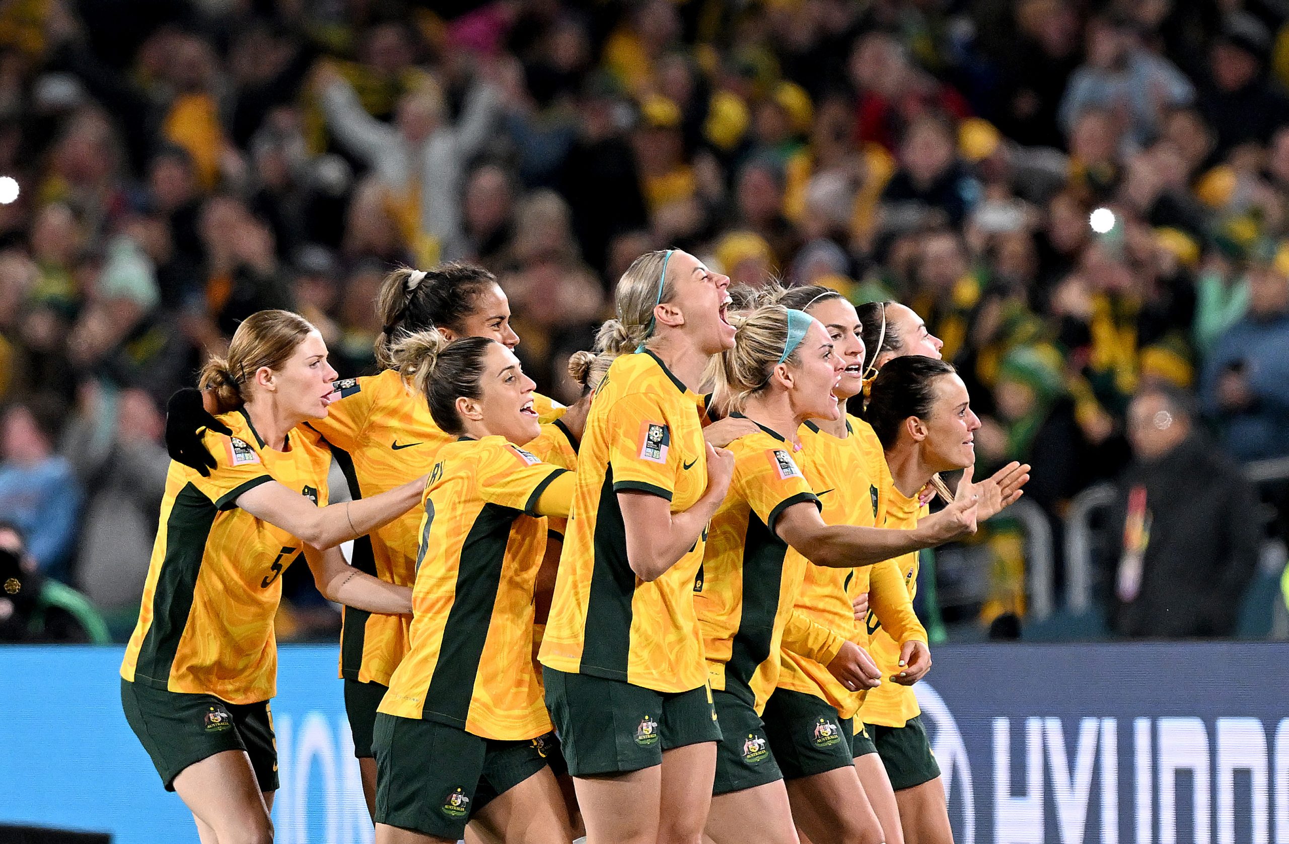 SYDNEY, AUSTRALIA - JULY 20: Steph Catley of the Matildas celebrates with her team mates after scoring a goal during the FIFA Women's World Cup Australia & New Zealand 2023 Group B match between Australia and Ireland at Stadium Australia on July 20, 2023 in Sydney, Australia. (Photo by Bradley Kanaris/Getty Images)