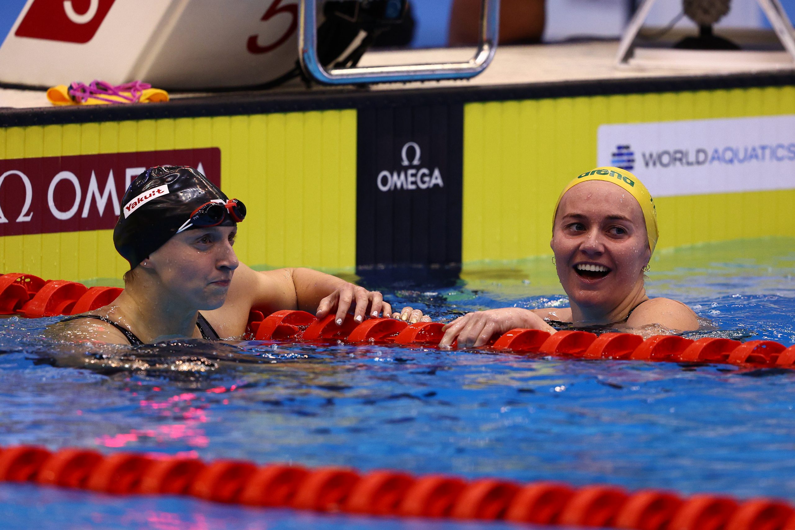 FUKUOKA, JAPAN - JULY 23:  Ariarne Titmus of Team Australia (R) reacts after winning gold in the Women's 400m Freestyle Final in a new world record time of WR 3:55.38 on day one of the Fukuoka 2023 World Aquatics Championships at Marine Messe Fukuoka Hall A on July 23, 2023 in Fukuoka, Japan. (Photo by Clive Rose/Getty Images)