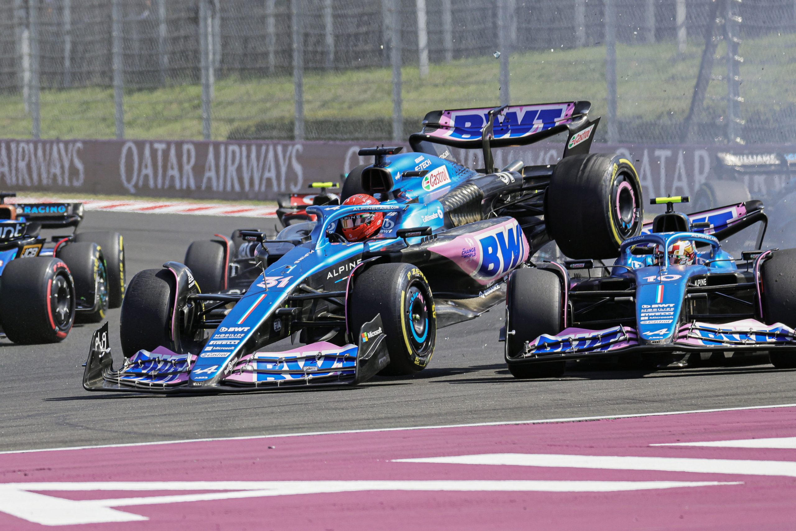 Esteban Ocon of France driving the (31) Alpine F1 A522 Renault (L) and Pierre Gasly of France driving the (10) Alpine F1 A522 Renault (R) collide during the F1 Grand Prix of Hungary at Hungaroring on July 23, 2023 in Budapest, Hungary. (Photo by Qian Jun/MB Media/Getty Images)