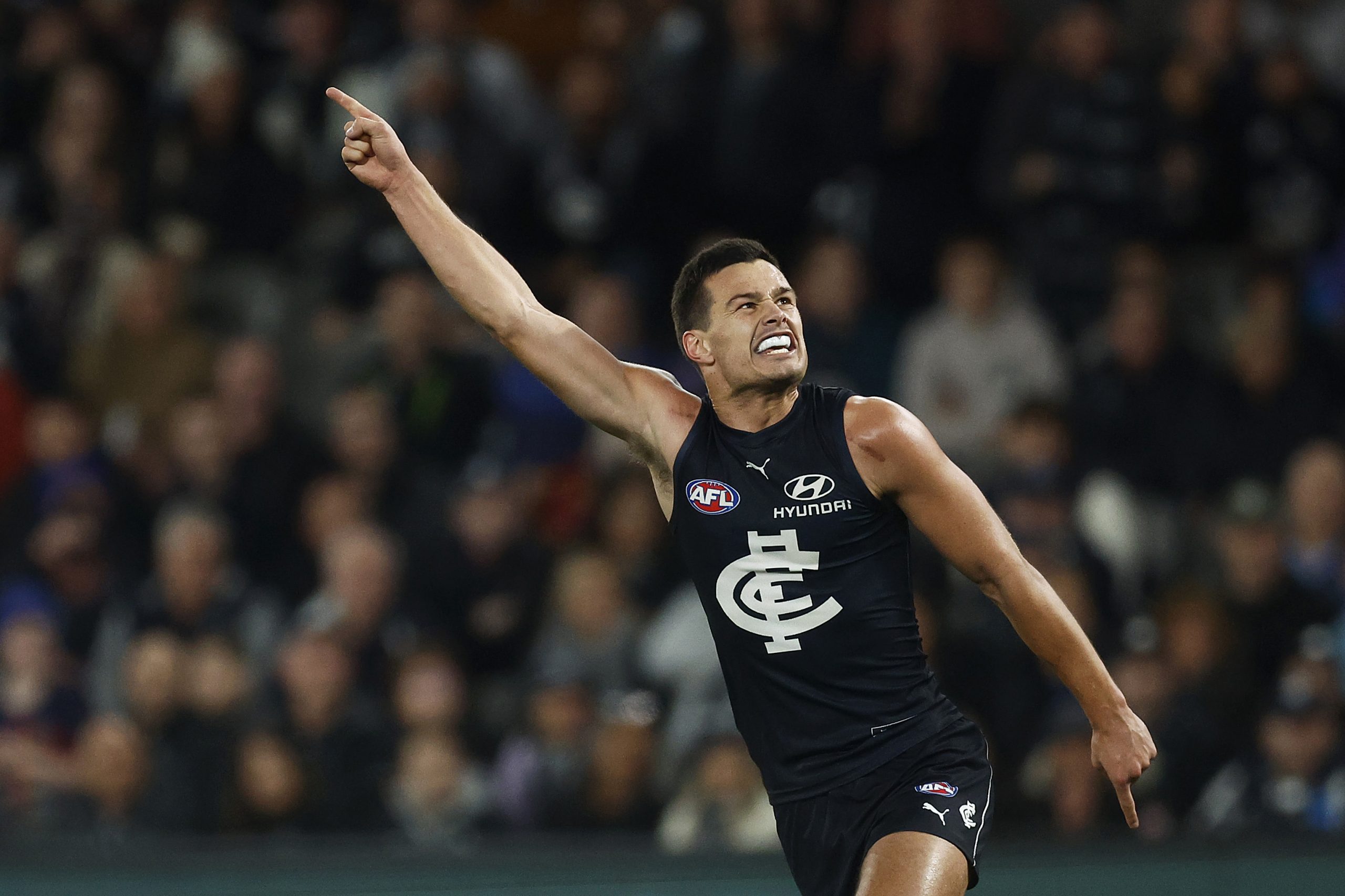 MELBOURNE, AUSTRALIA - JULY 15: Jack Silvagni of the Blues celebrates kicking his fourth goal during the round 18 AFL match between Carlton Blues and Port Adelaide Power at Marvel Stadium, on July 15, 2023, in Melbourne, Australia. (Photo by Daniel Pockett/Getty Images)