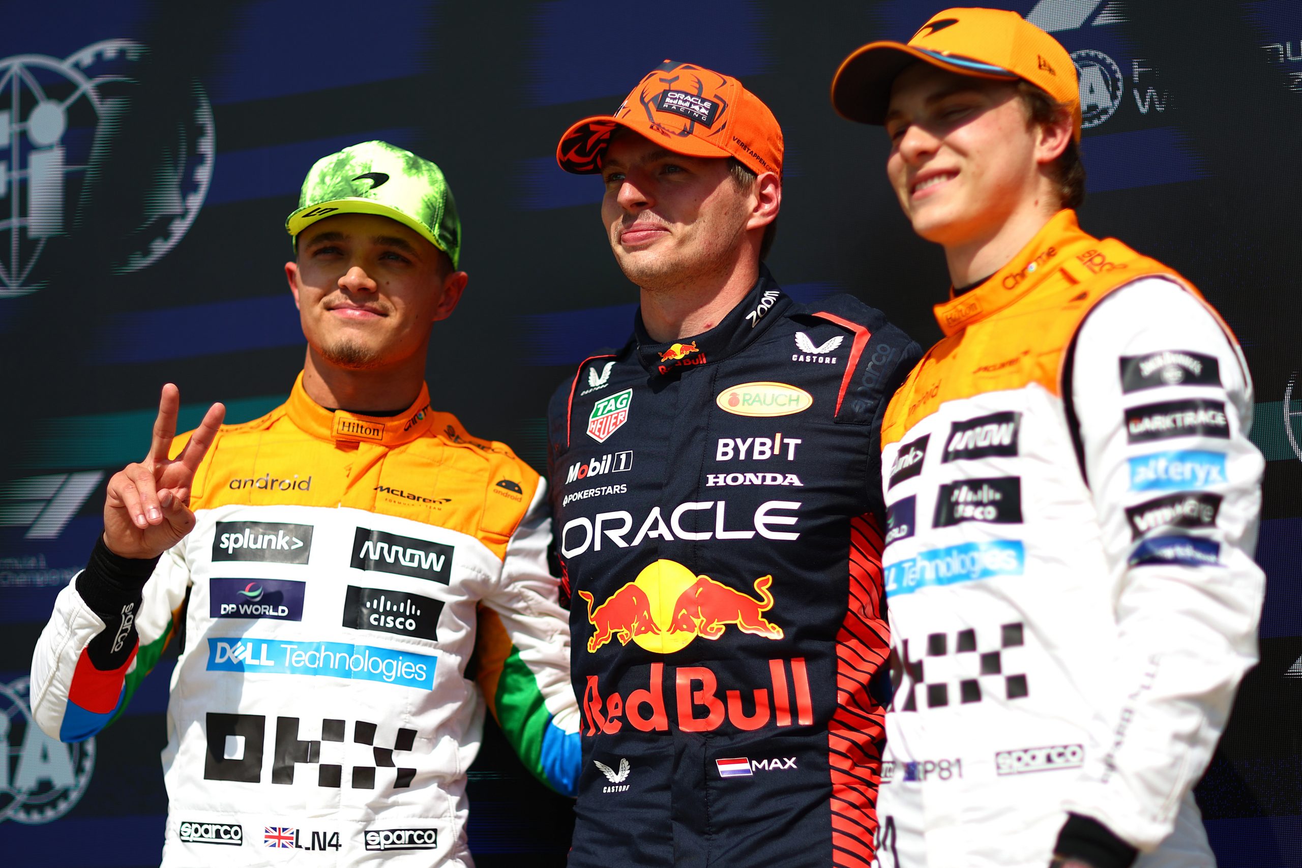 Pole position qualifier Max Verstappen of the Netherlands and Oracle Red Bull Racing, Second placed qualifier Lando Norris of Great Britain and McLaren and Third placed qualifier Oscar Piastri of Australia and McLaren pose for a photo in parc ferme during qualifying ahead of the F1 Grand Prix of Great Britain at Silverstone Circuit on July 08, 2023 in Northampton, England. (Photo by Dan Istitene - Formula 1/Formula 1 via Getty Images)