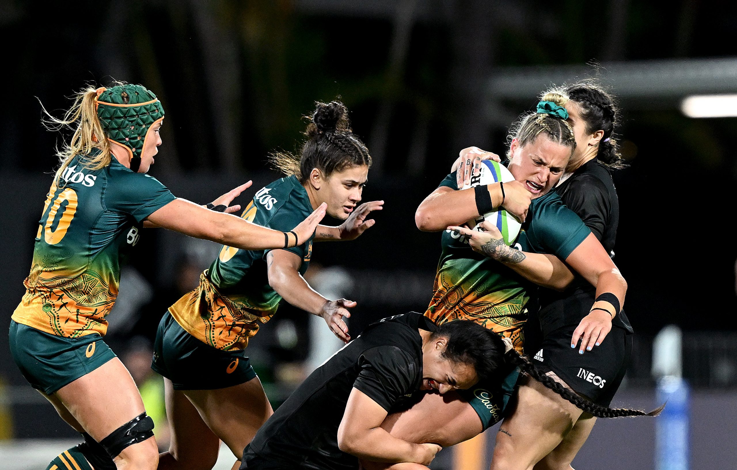 Arabella McKenzie of Australia is tackled during the Pacific Four Series & O'Reilly Cup match between the Australian Wallaroos and New Zealand Black Ferns.