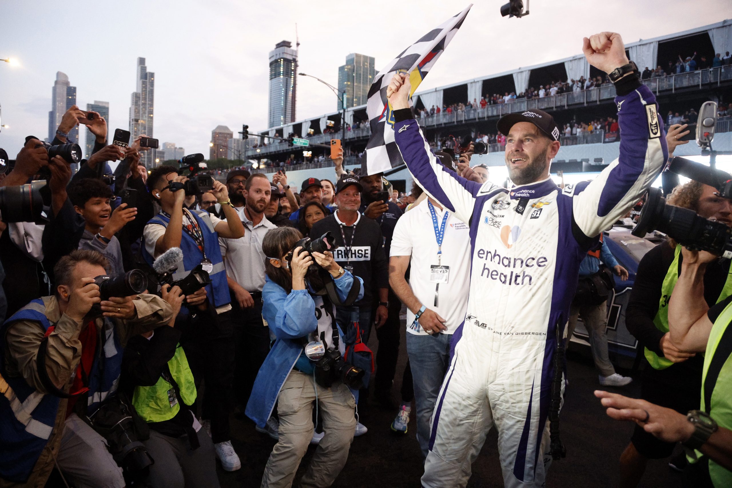 Shane van Gisbergen celebrates winning his first NASCAR Cup Series race in Chicago.