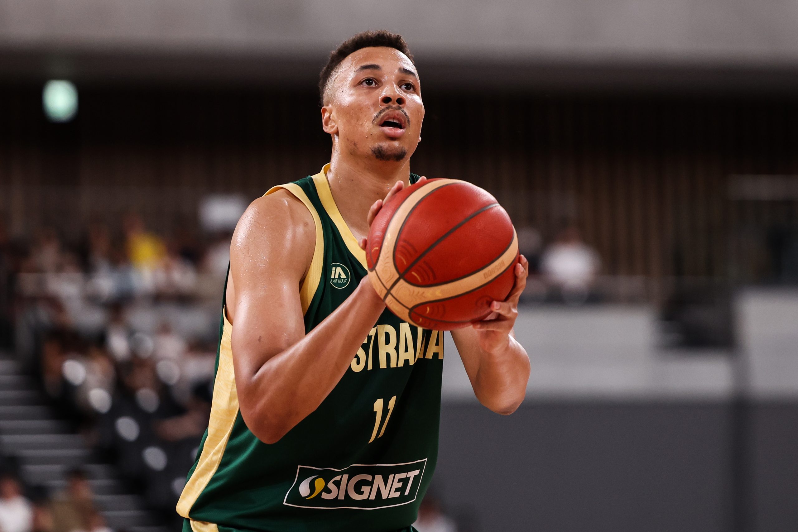 Dante Exum shoots a free throw against Finland.