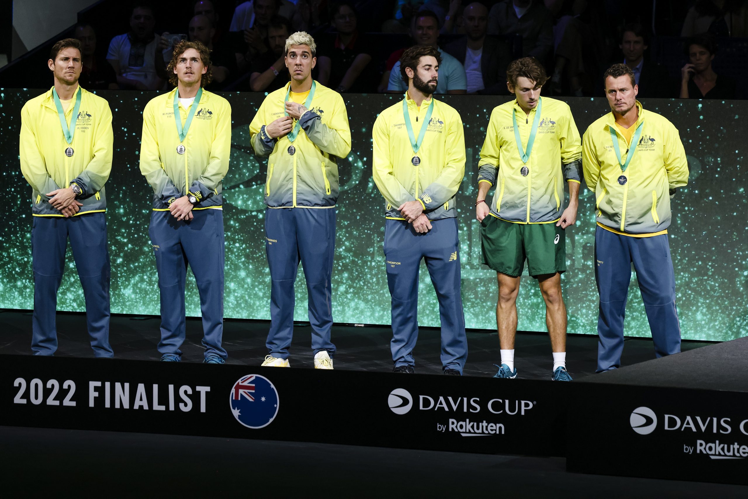 Australians Matthew Ebden (left to right), Max Purcell, Thanasi Kokkinakis, Jordan Thompson, Alex de Minaur and team captain Lleyton Hewitt stand on the podium during the award ceremony.