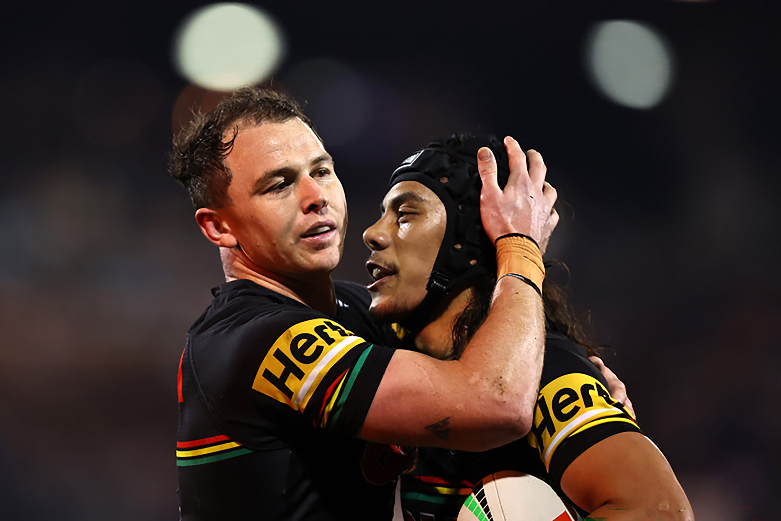 PENRITH, AUSTRALIA - JULY 29: Dylan Edwards of the Panthers embrace with Jarome Luai of the Panthers during the round 22 NRL match between Penrith Panthers and Cronulla Sharks at BlueBet Stadium on July 29, 2023 in Penrith, Australia. (Photo by Jeremy Ng/Getty Images)