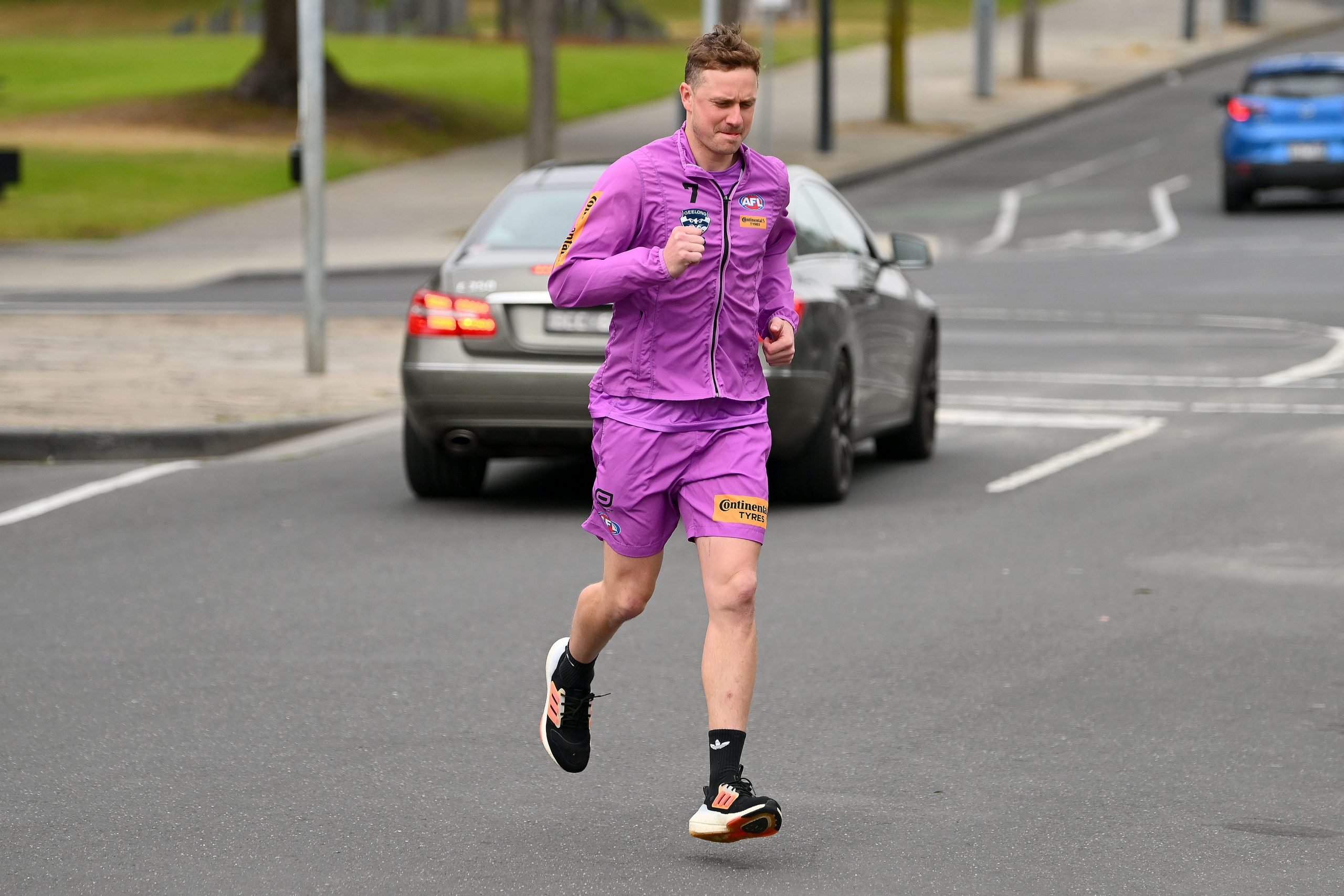 Mitch Duncan comes running in as Cats runner Shannon Byrnes for Mad Monday.