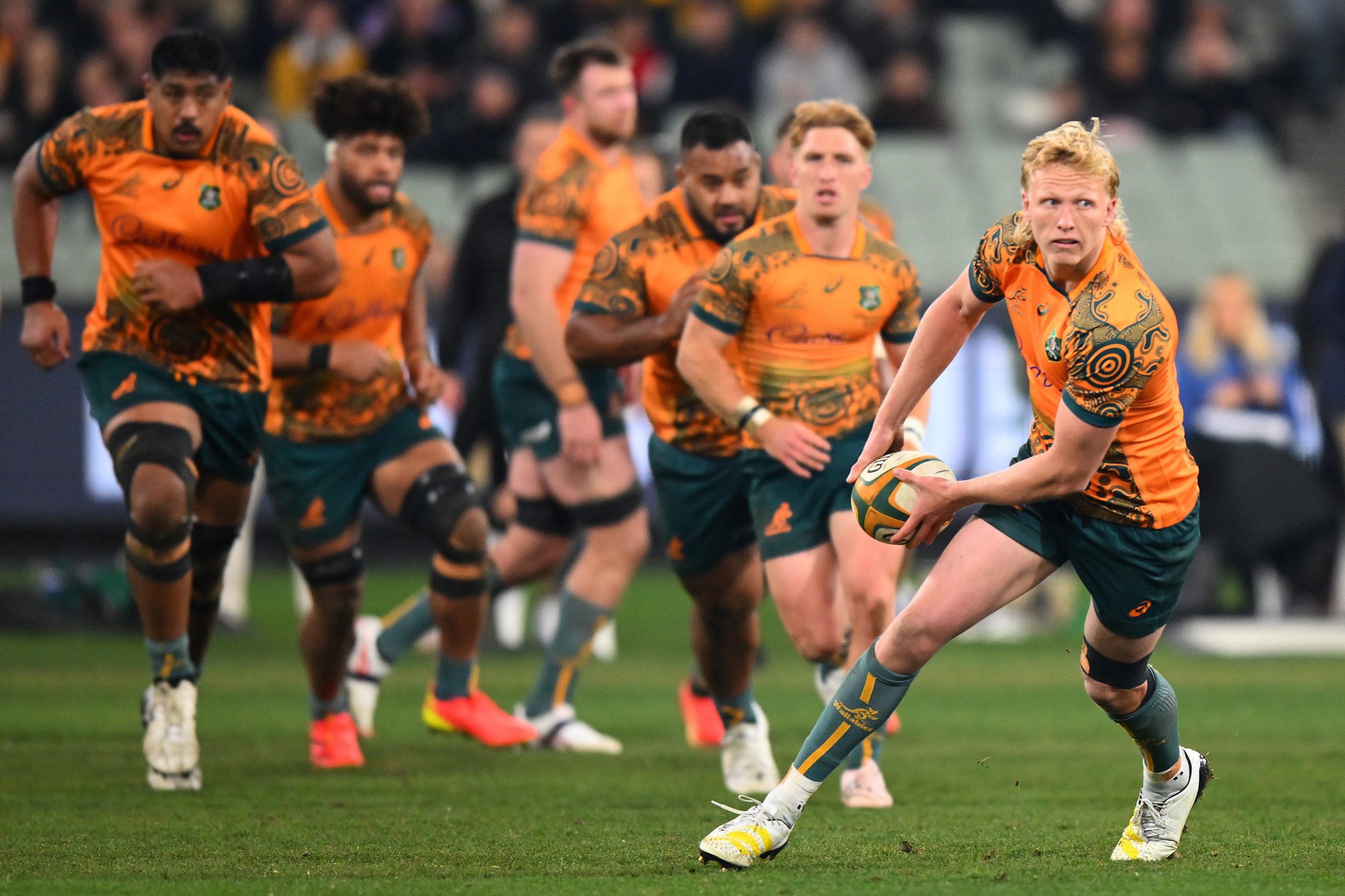 Carter Gordon of the Wallabies passes the ball.