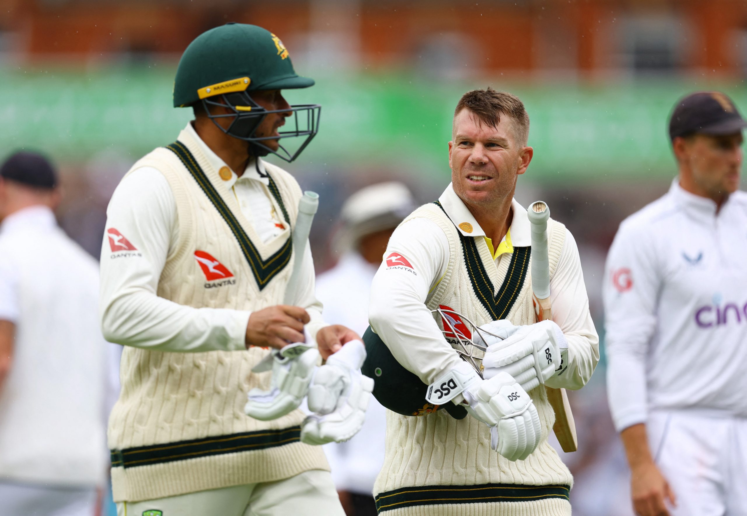 Australia's David Warner and Usman Khawaja leave the field at The Oval.
