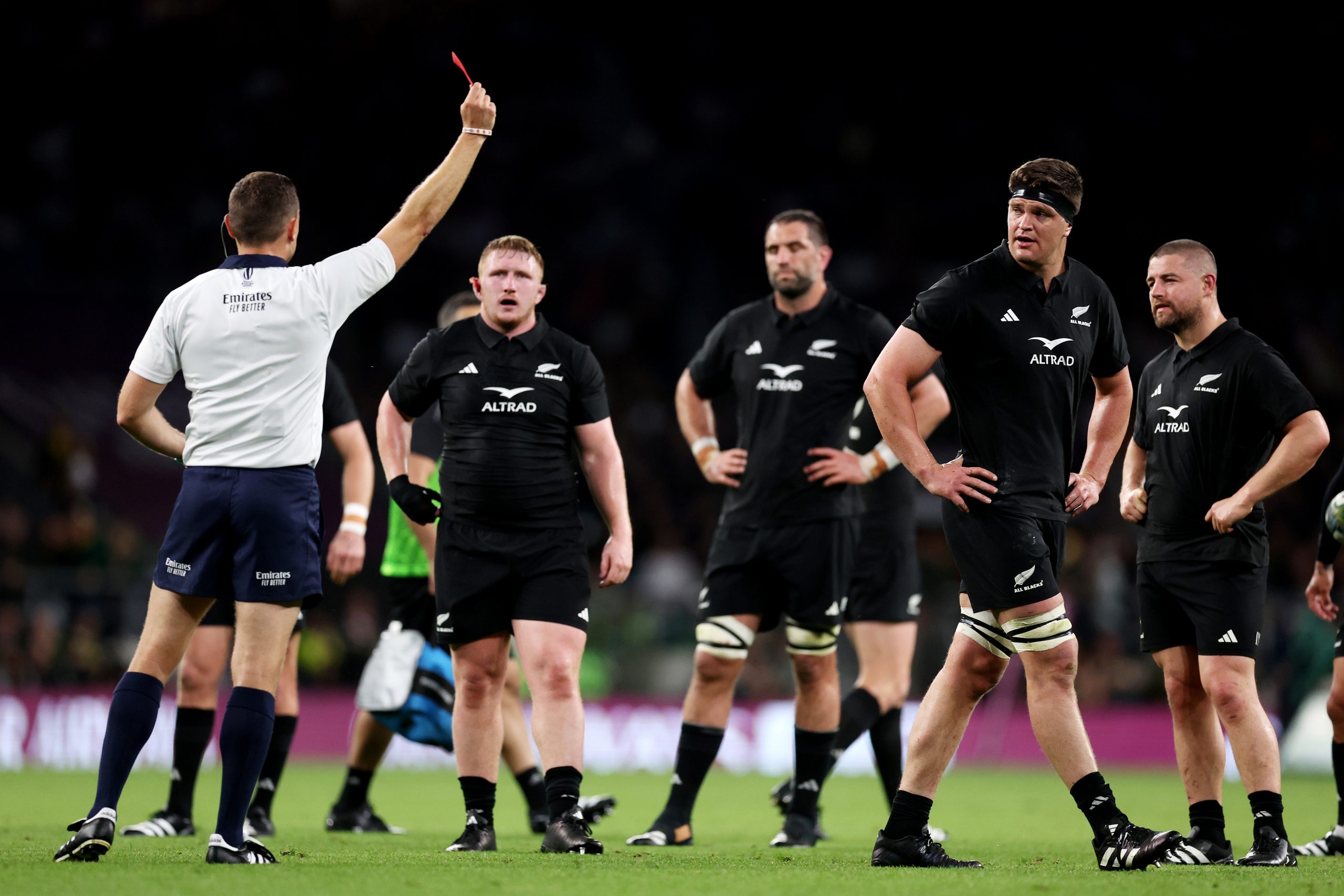 Scott Barrett of New Zealand is sent off by referee Matthew Carley after a receiving a second yellow card.