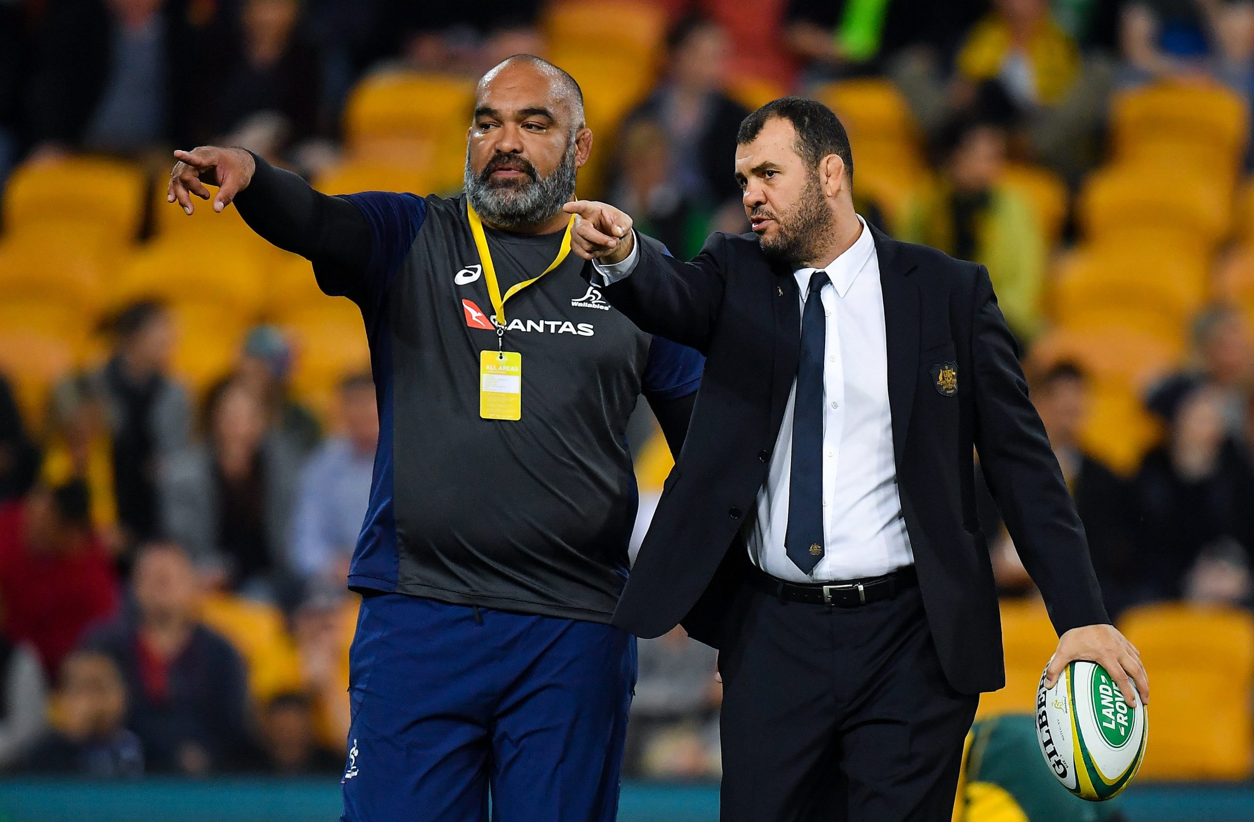 Australia coach Michael Cheika with forwards coach Simon Raiwalui.