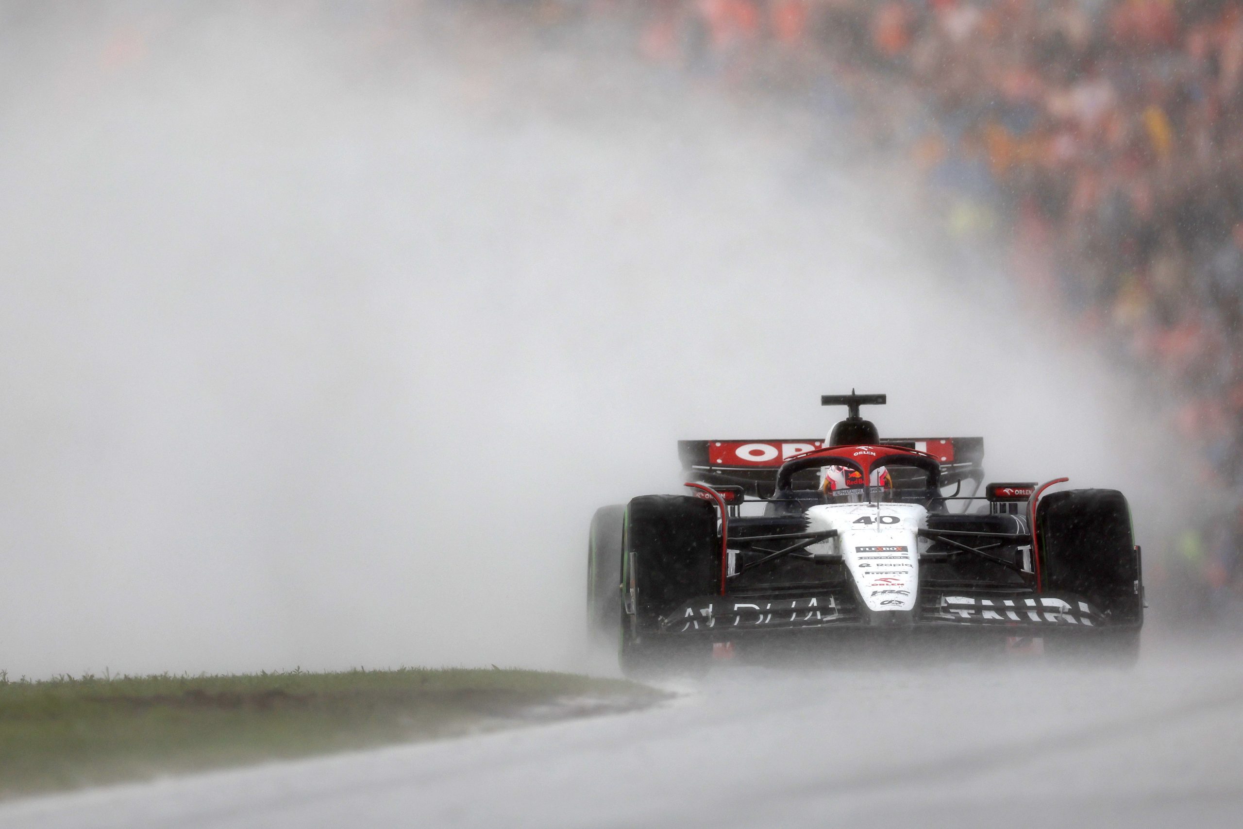 Liam Lawson of New Zealand driving the (40) Scuderia AlphaTauri AT04 in the rain during the F1 Grand Prix of The Netherlands at Circuit Zandvoort on August 27, 2023 in Zandvoort, Netherlands. (Photo by Lars Baron/Getty Images)