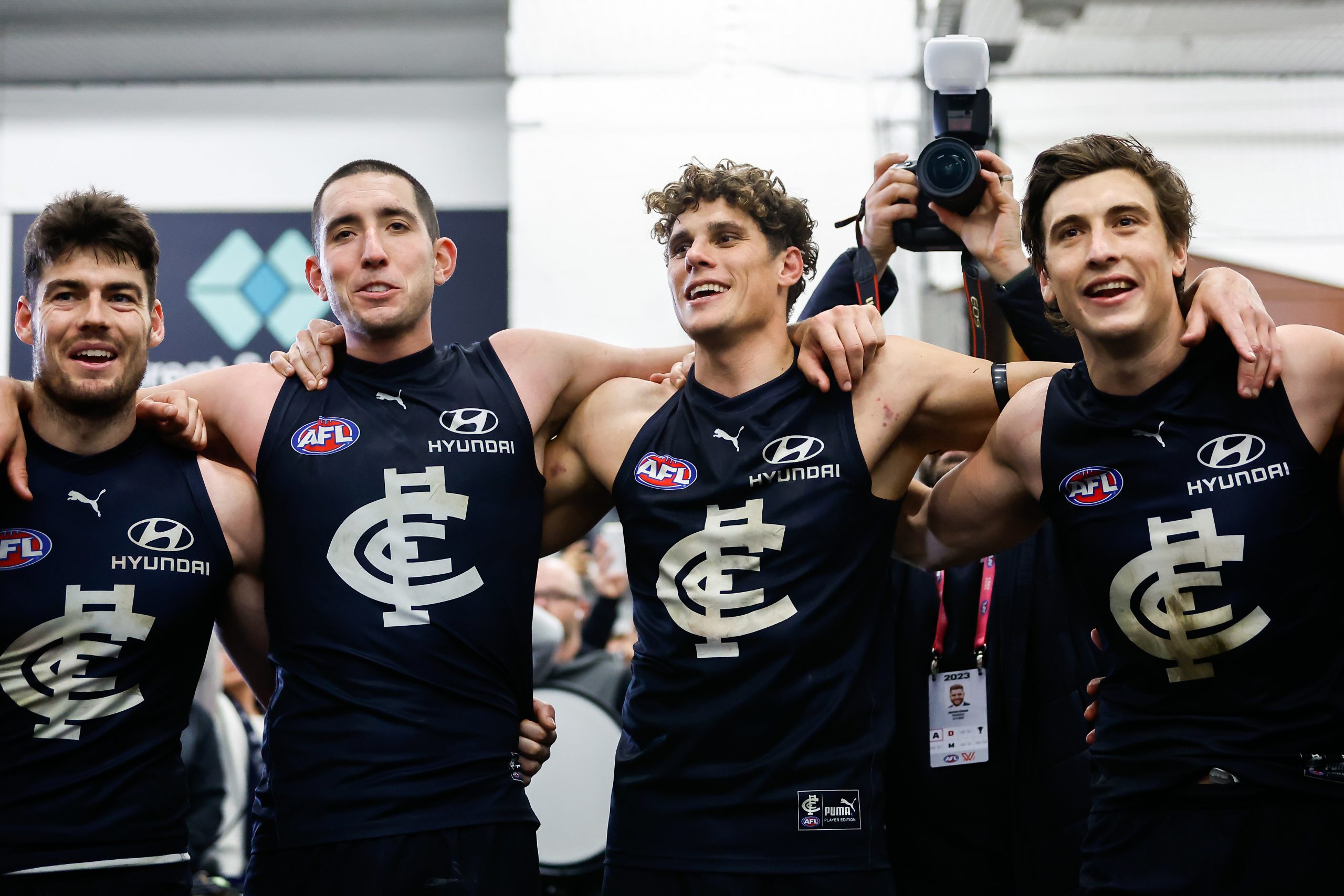 MELBOURNE, AUSTRALIA - AUGUST 12: Charlie Curnow of the Blues sings the team song during the 2023 AFL Round 22 match between the Carlton Blues and the Melbourne Demons at Melbourne Cricket Ground on August 12, 2023 in Melbourne, Australia. (Photo by Dylan Burns/AFL Photos via Getty Images)